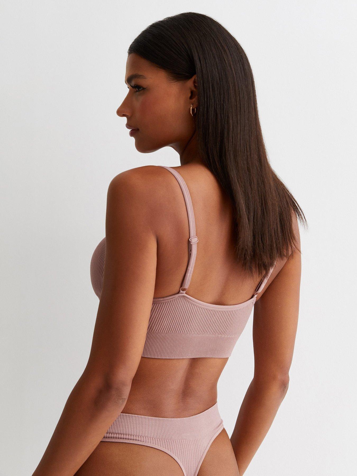 new-look-deep-pink-ribbed-seamless-bralettestillFront