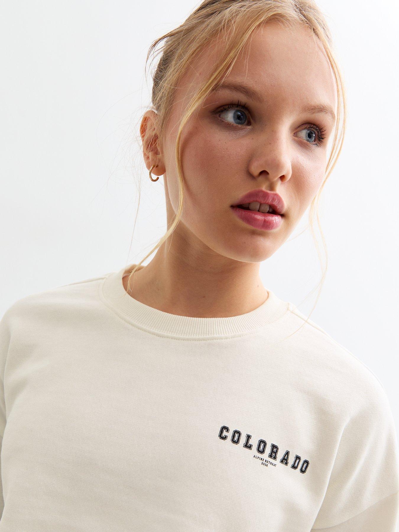 new-look-915-girls-colorado-slogan-cropped-jersey-sweatshirt-off-whitedetail