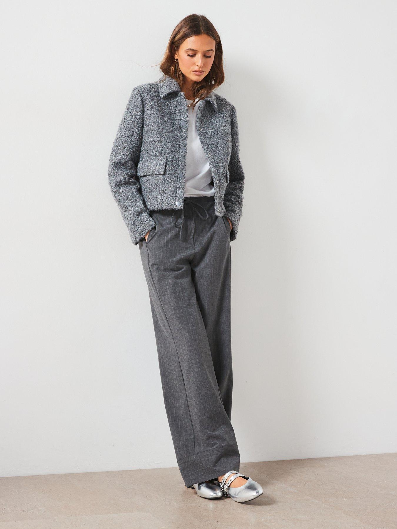 mango-textured-jacket-with-pocketsback