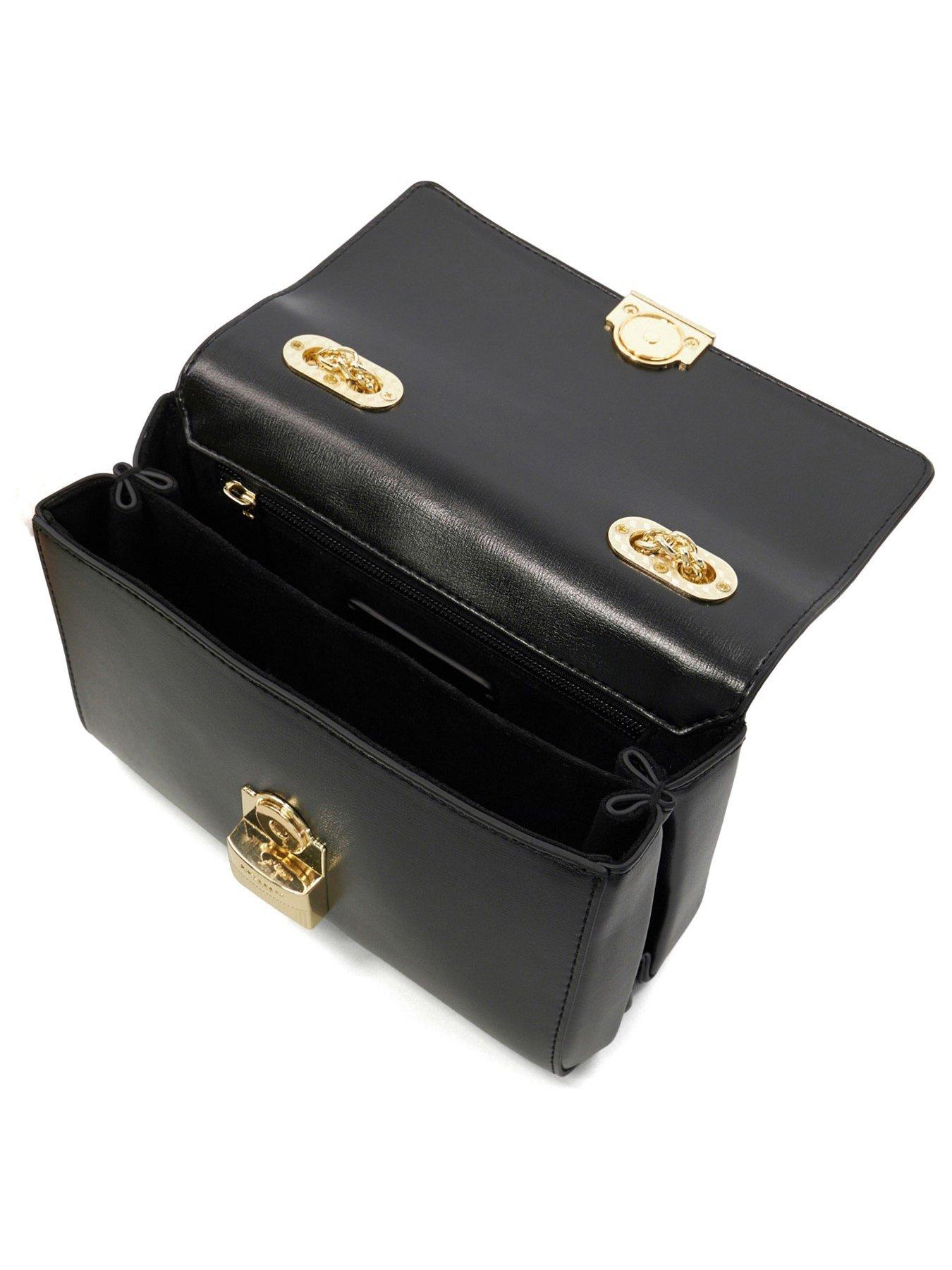 dune-london-definitive-hardware-detail-clutch-bag-blackdetail