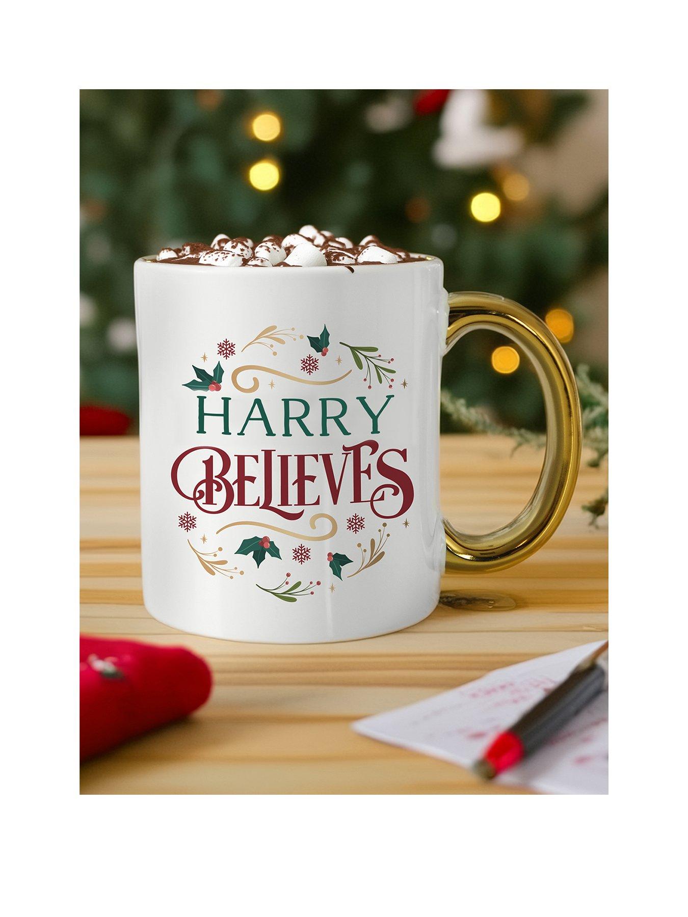 the-personalised-memento-company-personalised-believes-in-christmas-gold-handled-mug