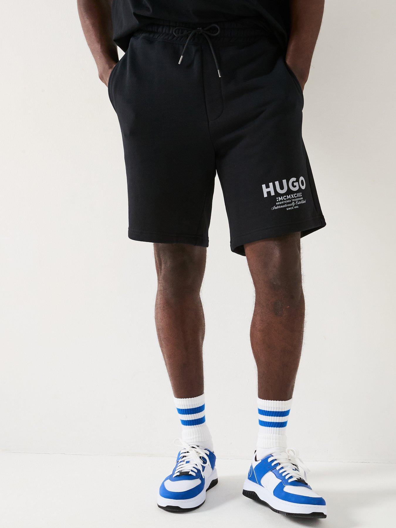 hugo-nomario-oversized-international-logo-jersey-shorts-black