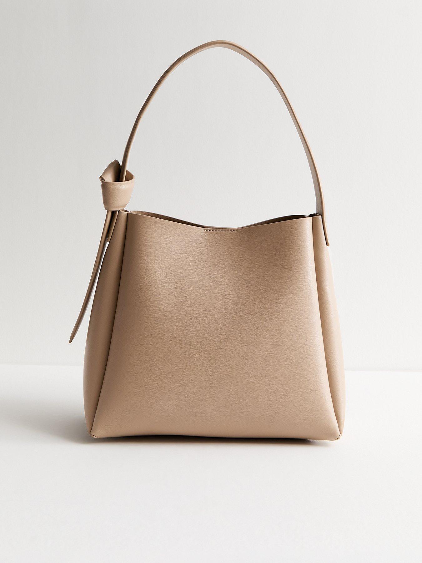 new-look-mink-faux-leather-knotted-strap-bucket-bag