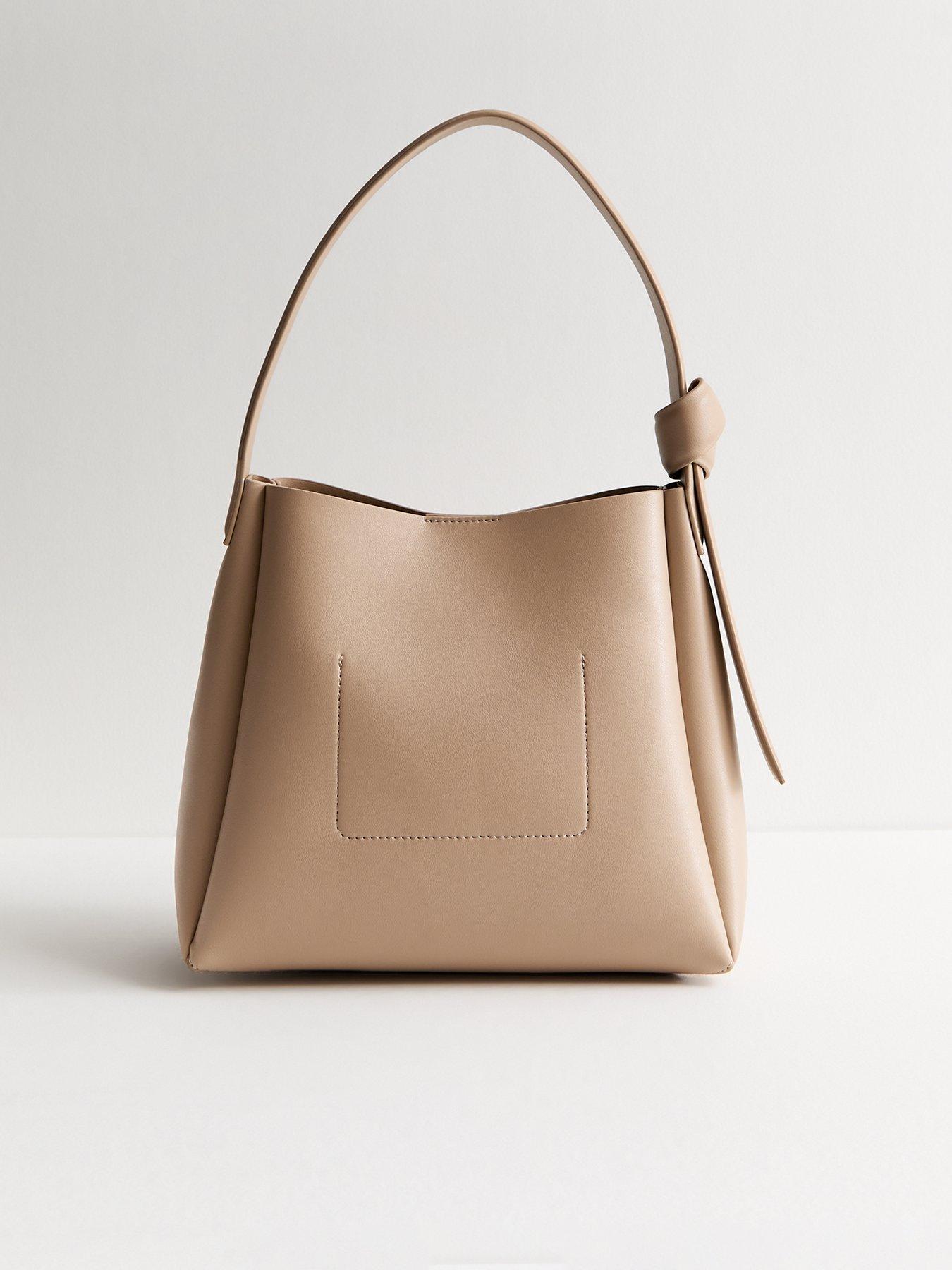 new-look-mink-faux-leather-knotted-strap-bucket-bagback