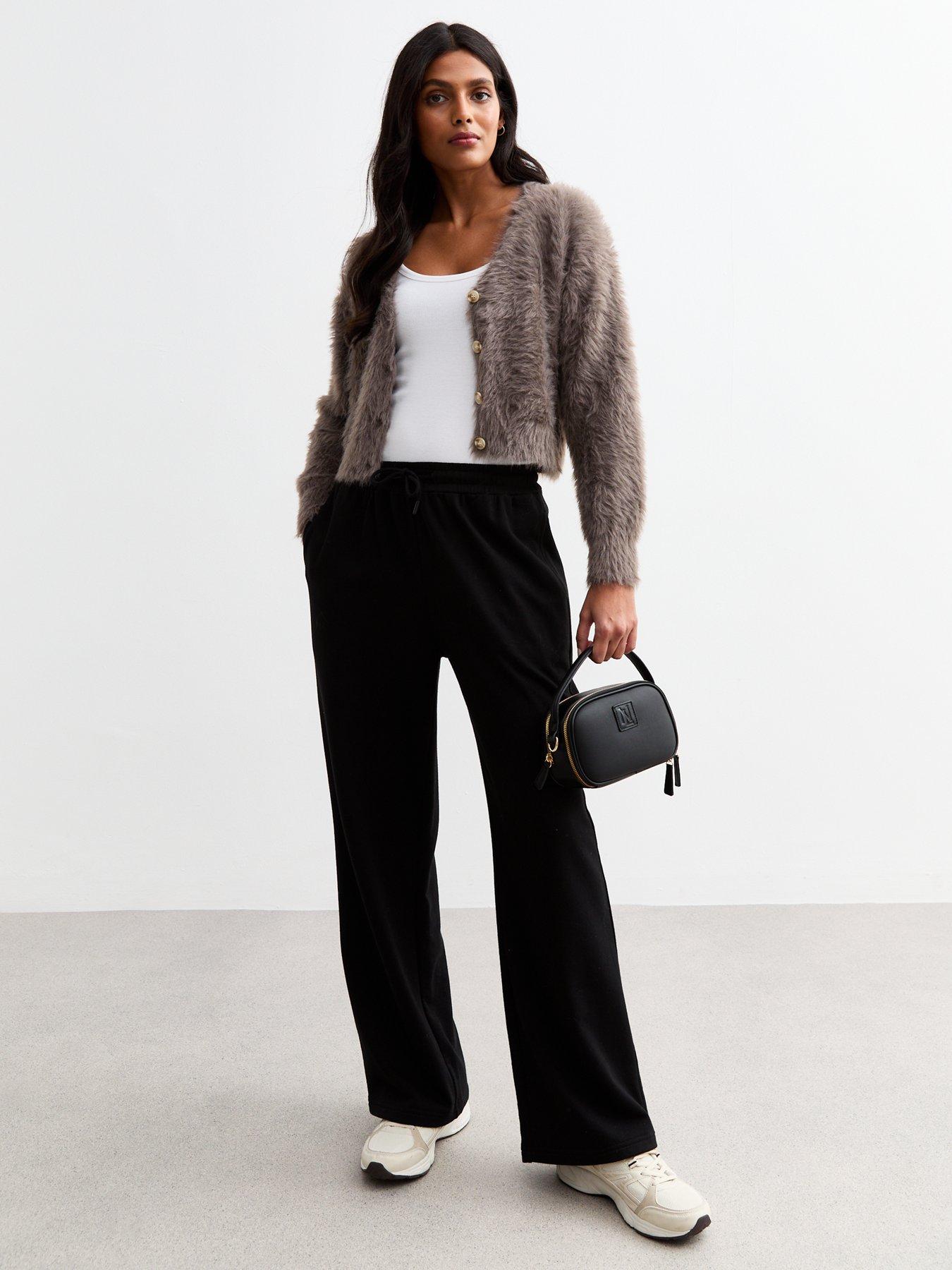 new-look-mink-fluffy-button-up-cardigan-beigeback