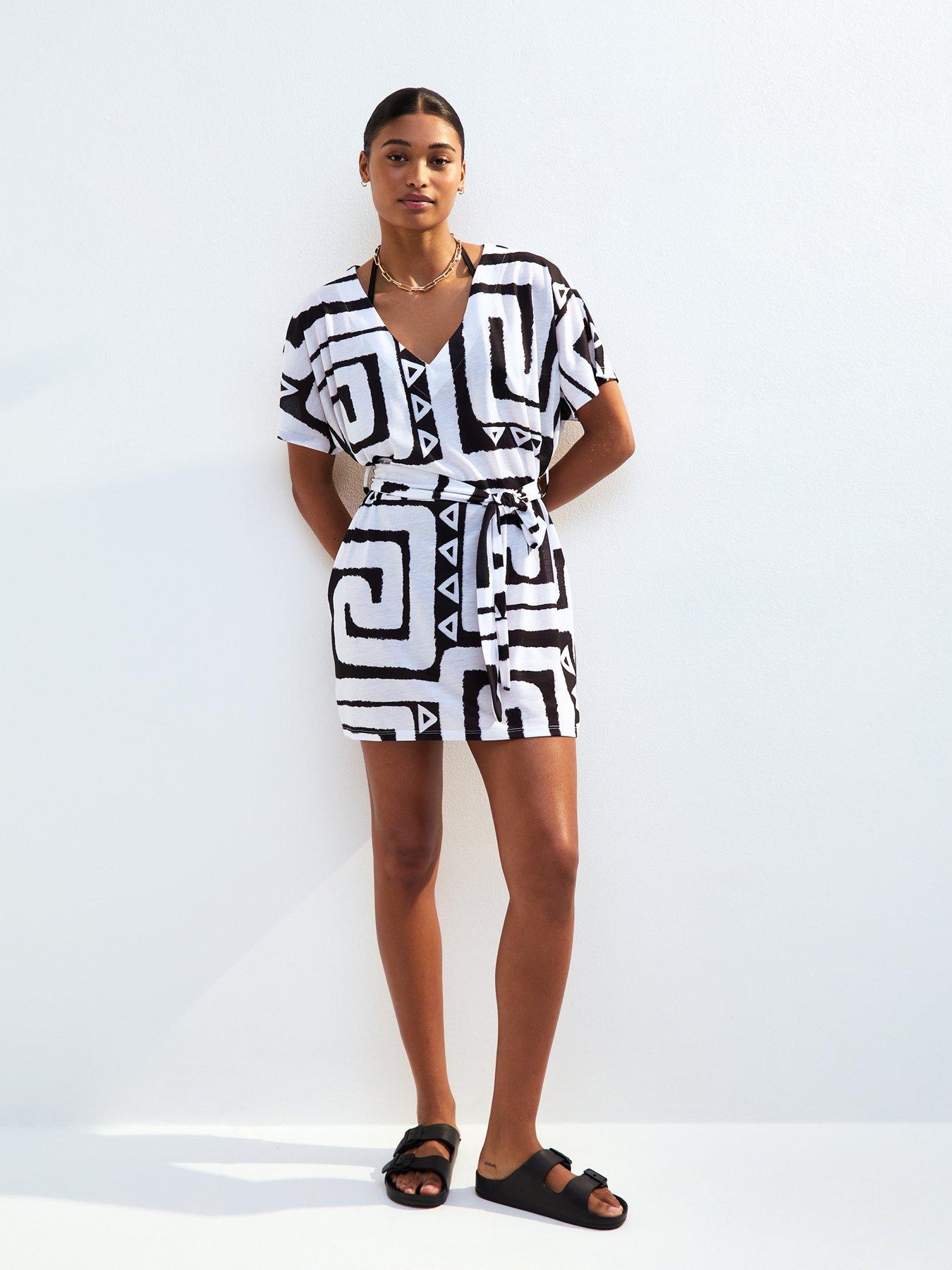 new-look-black-swirl-patterned-jersey-mini-beach-dressback