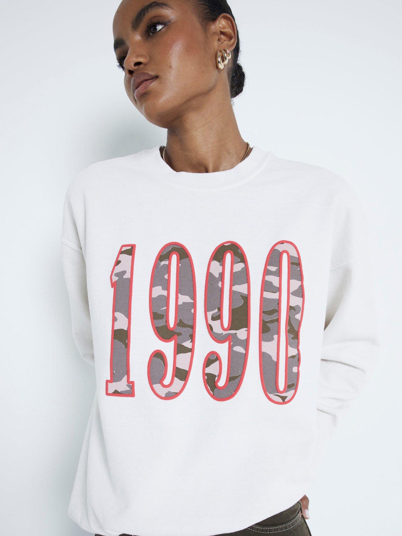Image 1 of 5 of River Island Camo Slogan Sweatshirt - Cream
