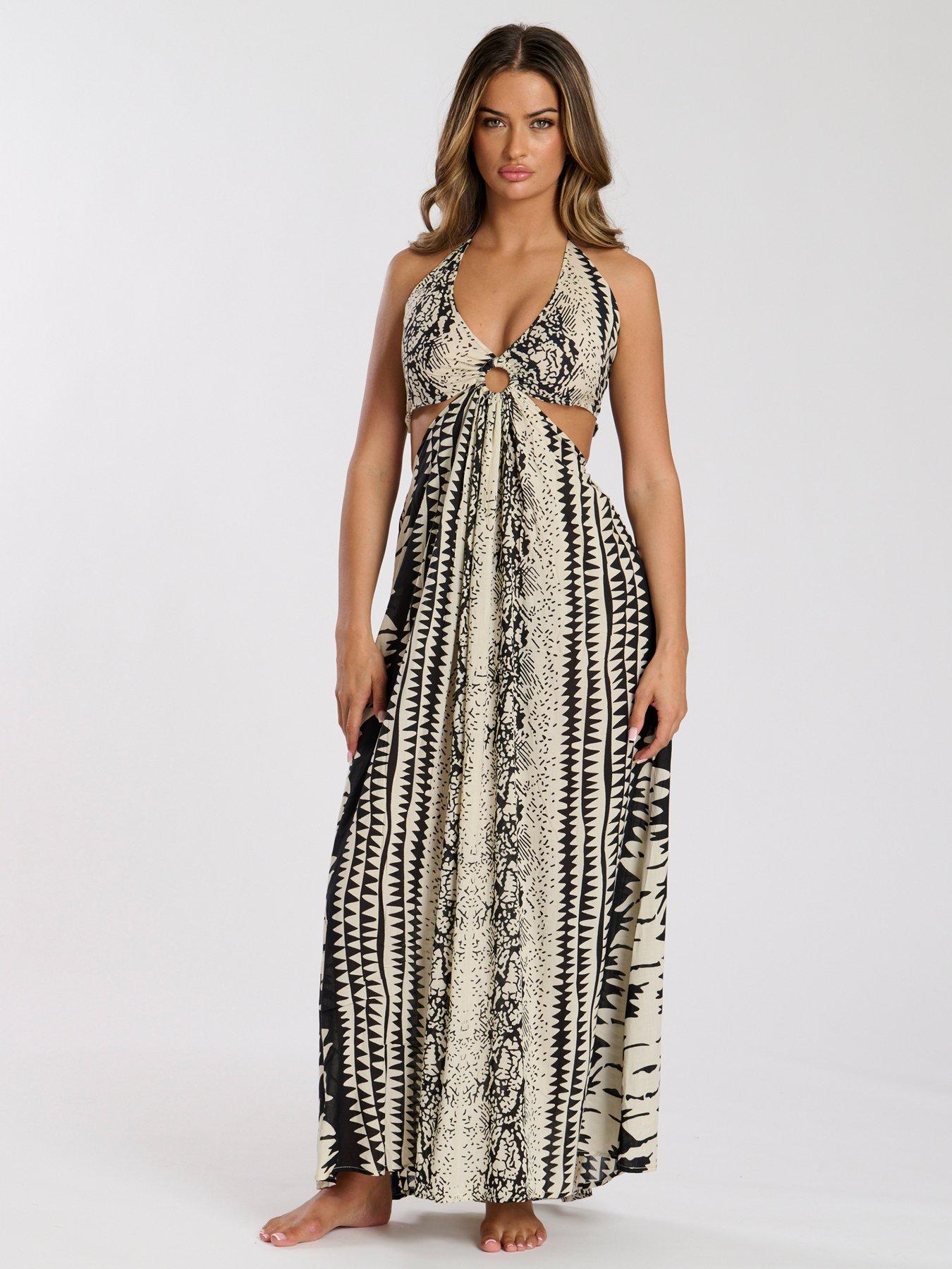 Image 1 of 5 of South Beach Printed Halter neck Ring Detail Beach Maxi Dress - Print