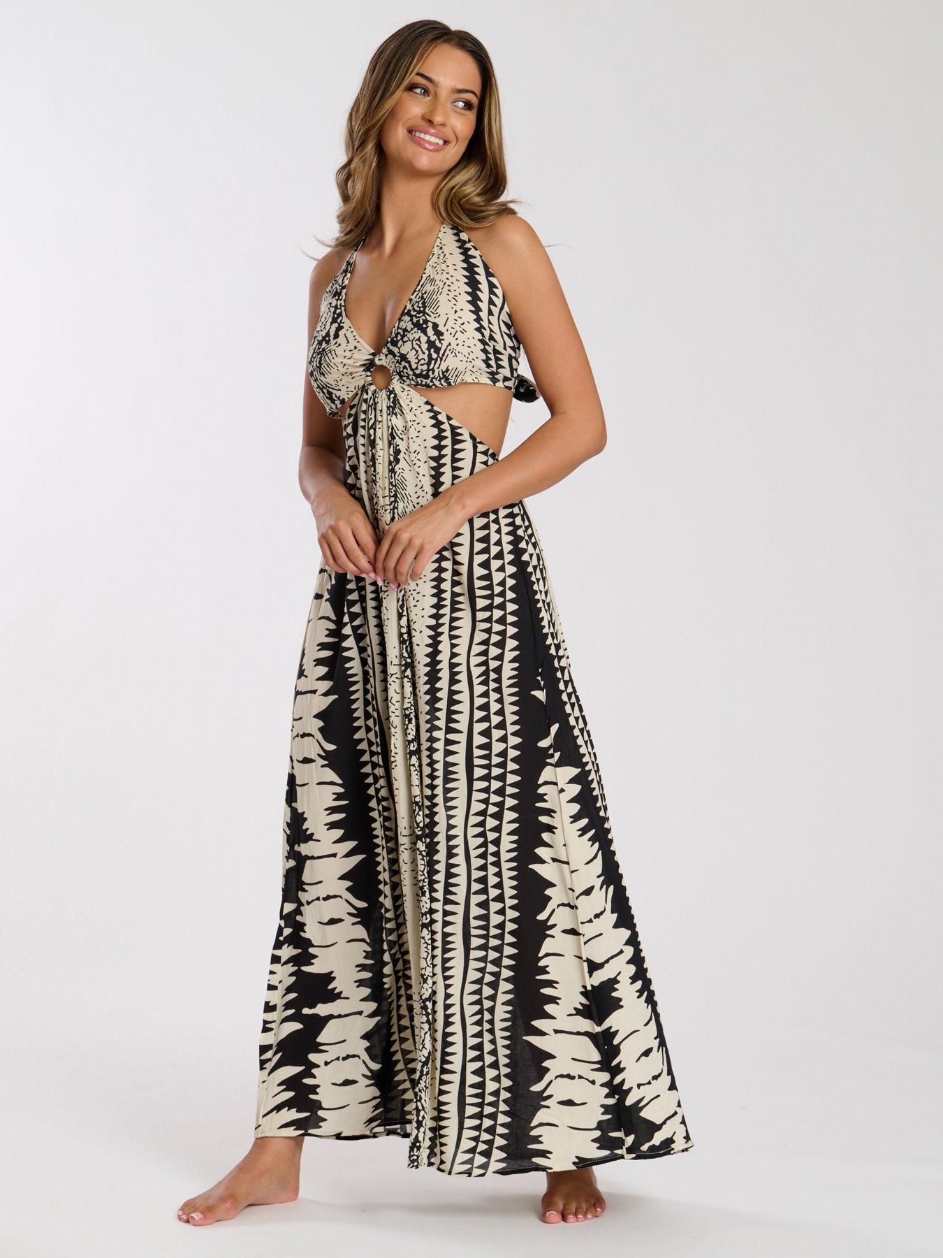 Image 4 of 5 of South Beach Printed Halter neck Ring Detail Beach Maxi Dress - Print