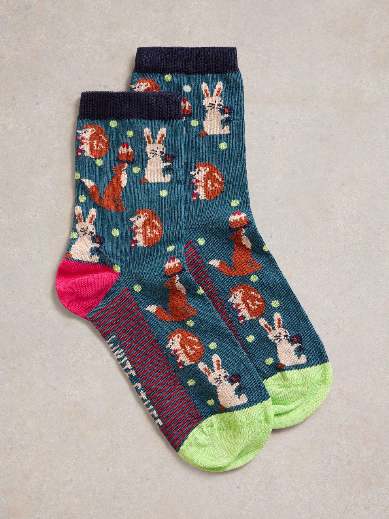 white-stuff-animal-sock-in-a-cracker-green