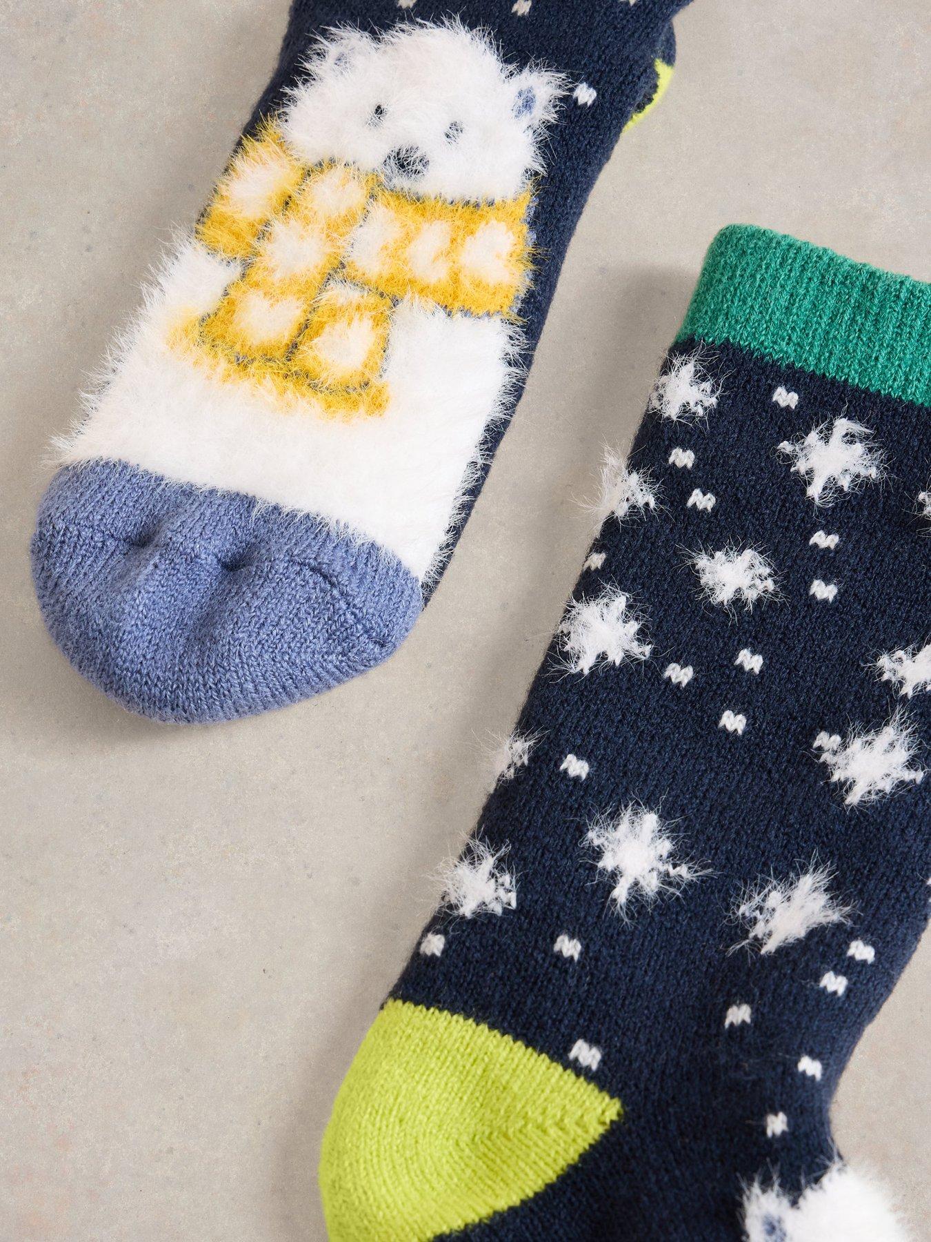 white-stuff-cosy-polar-bear-cabin-sock-navystillFront