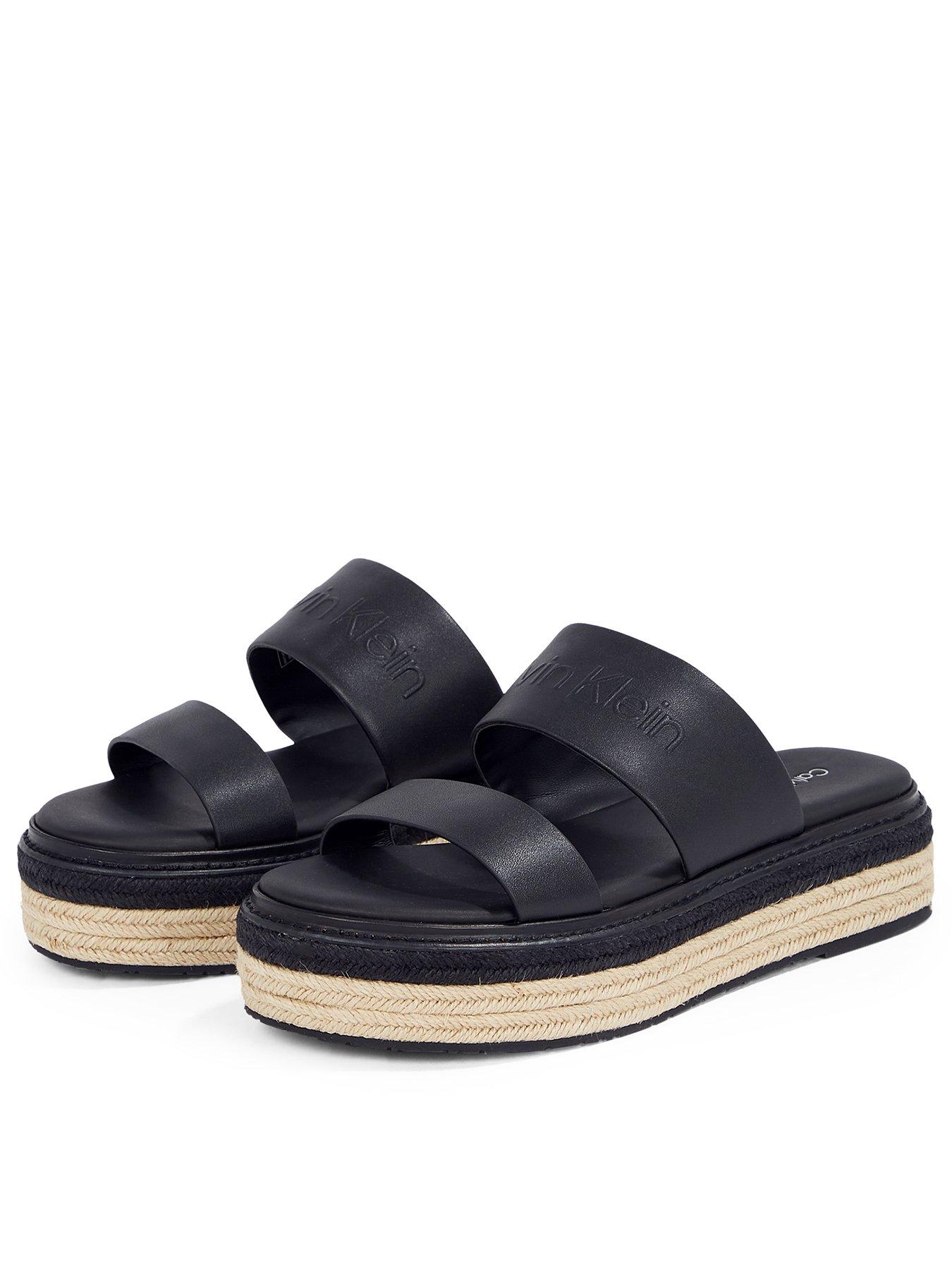 Image 1 of 5 of Calvin Klein Flatform Wedge Slide - Black