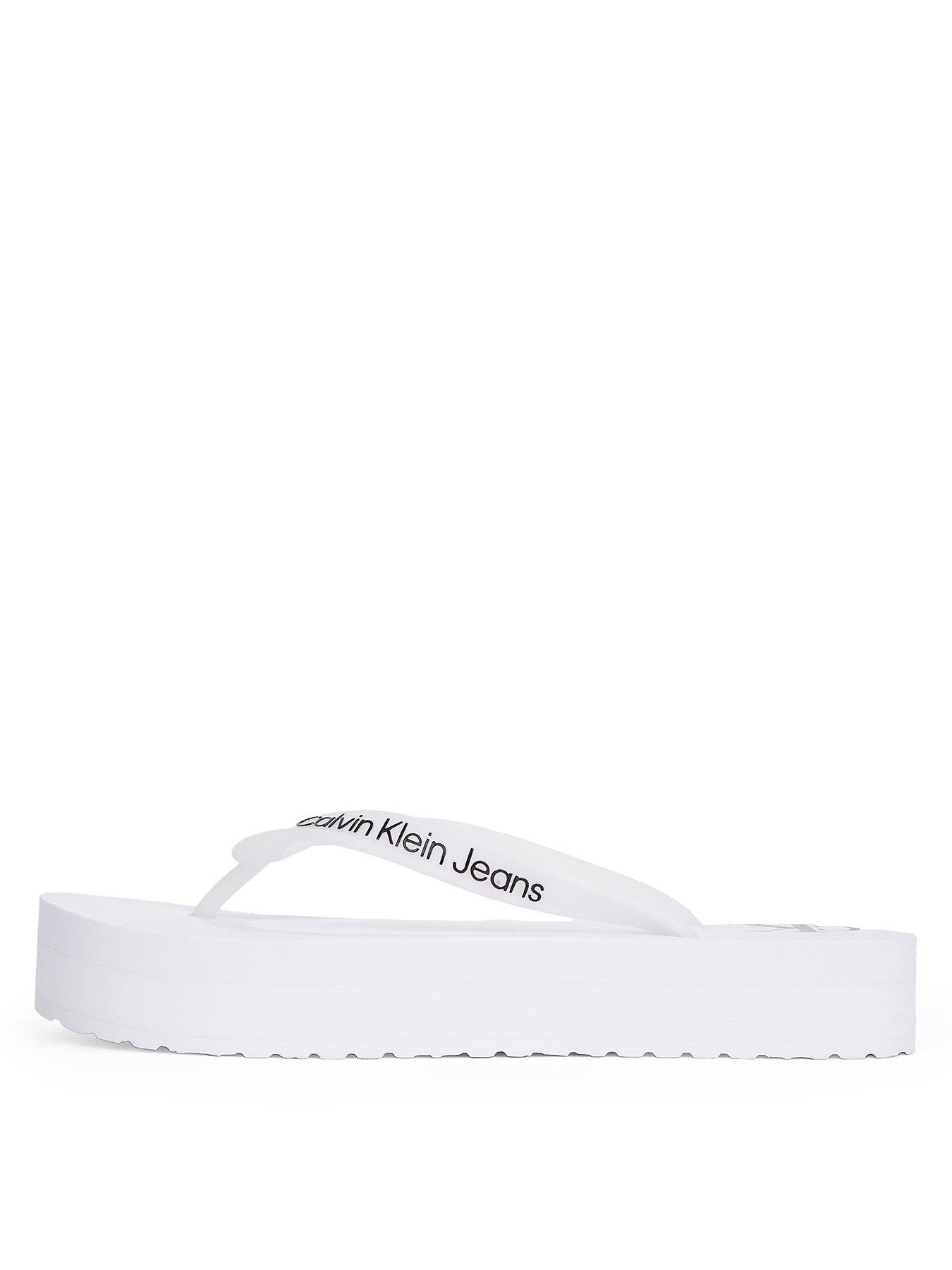 Image 2 of 5 of Calvin Klein Jeans Flatform Logo Flip-Flop - White