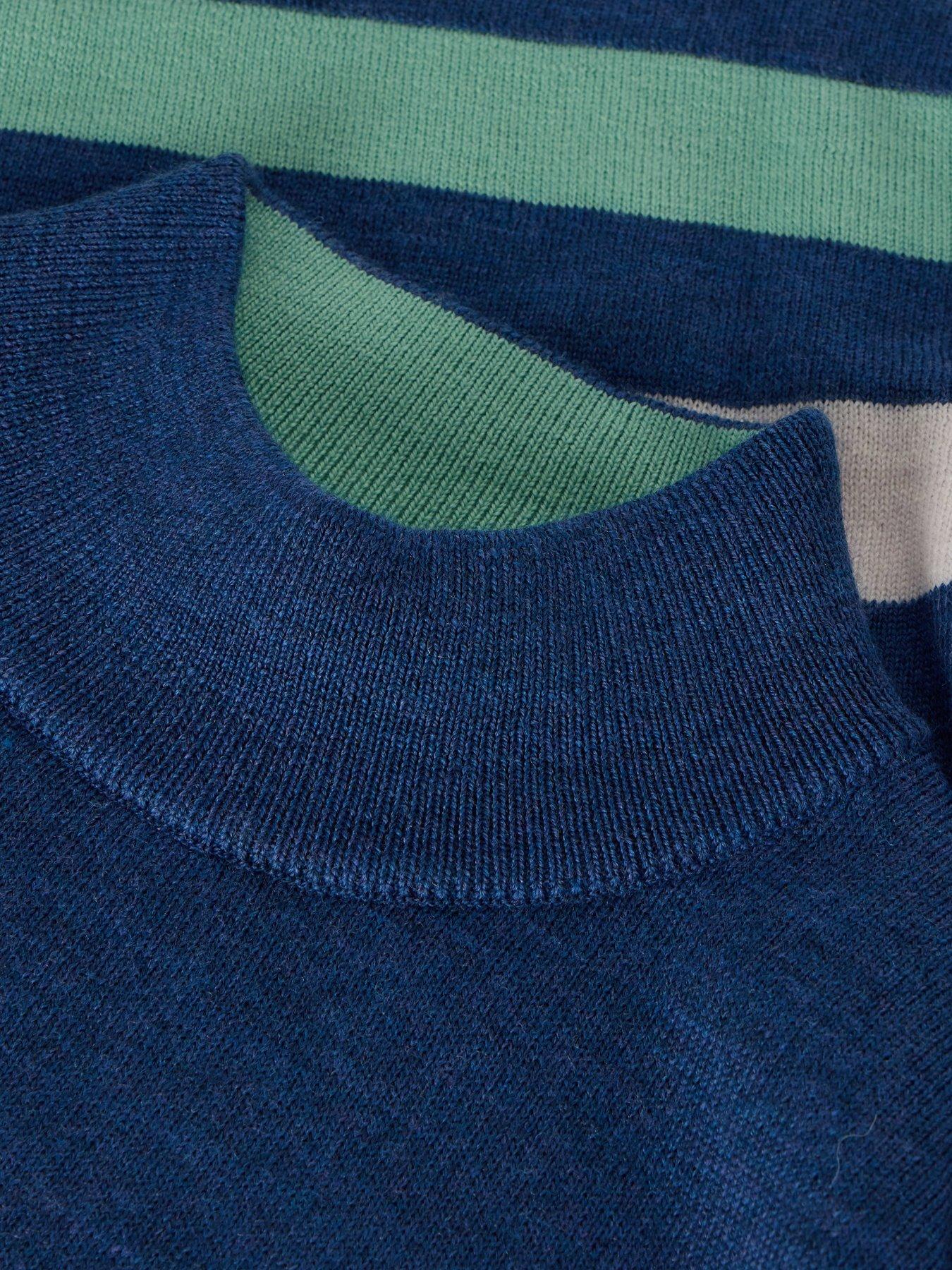 white-stuff-roll-neck-merino-jumper-bluedetail