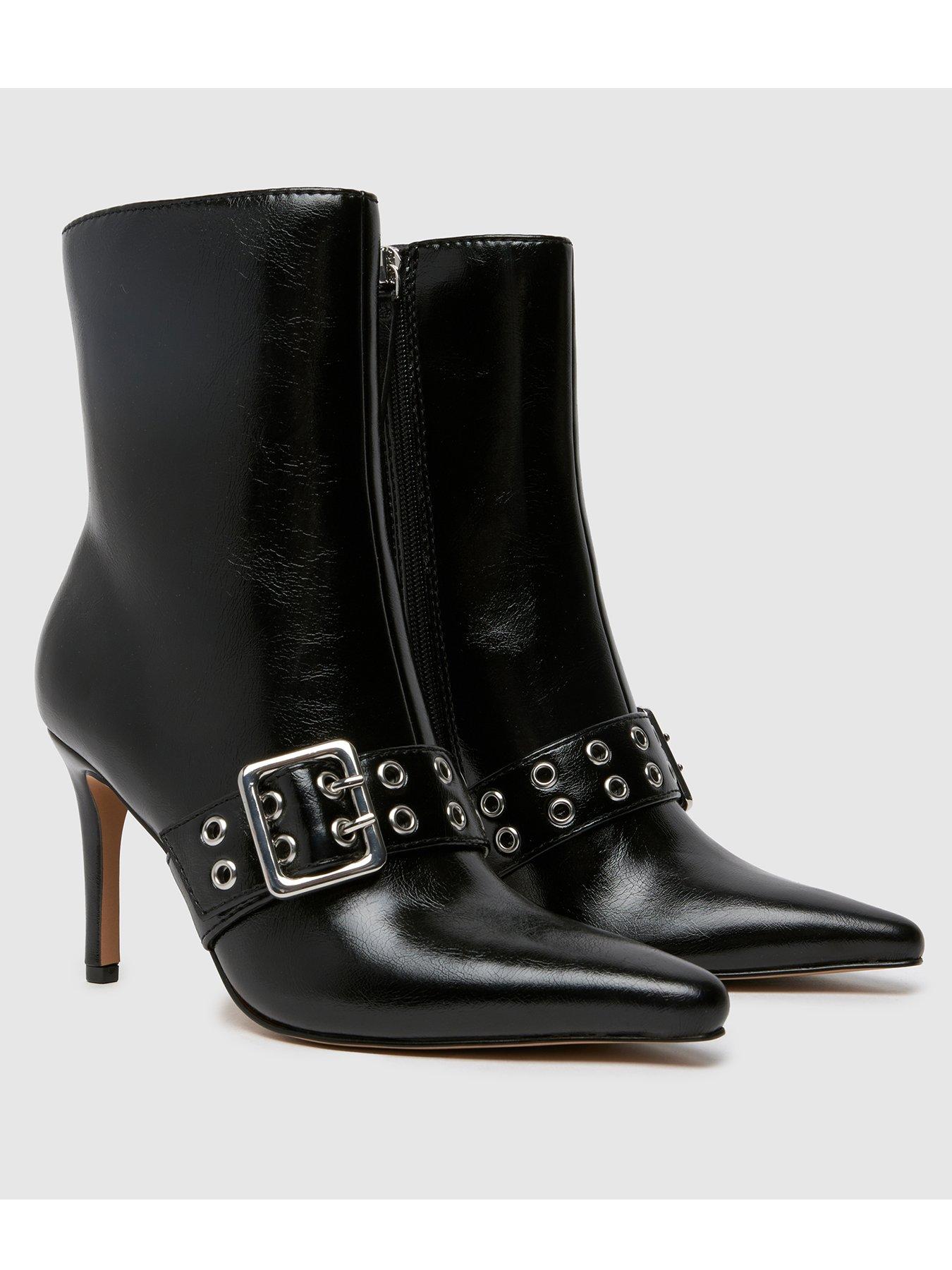 schuh-brogan-buckle-heeled-ankle-boot-blackstillFront