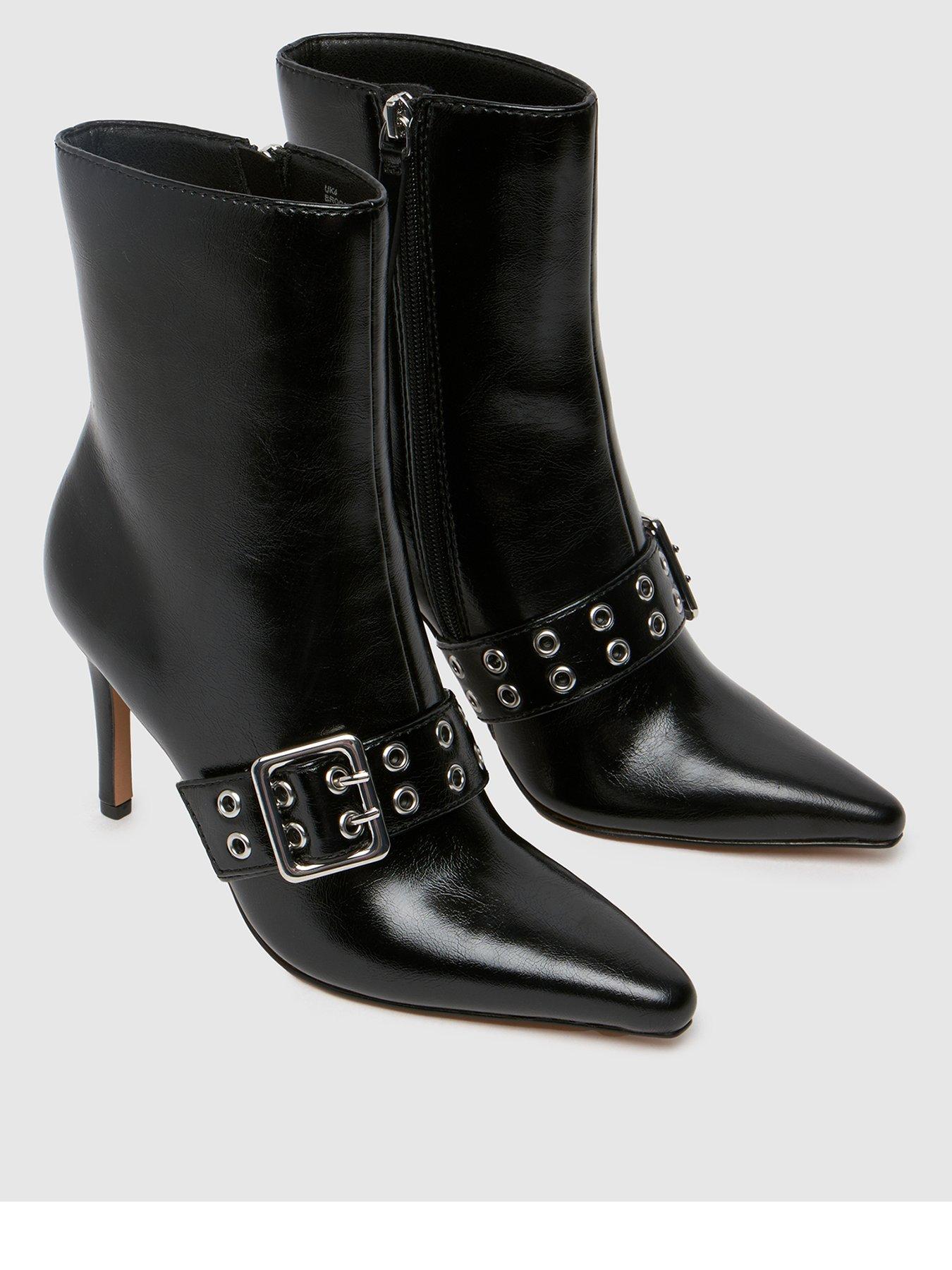 schuh-brogan-buckle-heeled-ankle-boot-blackback