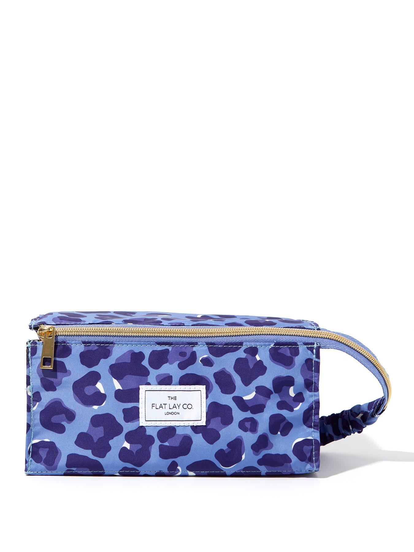 the-flat-lay-co-makeup-box-bag-in-blue-leopard