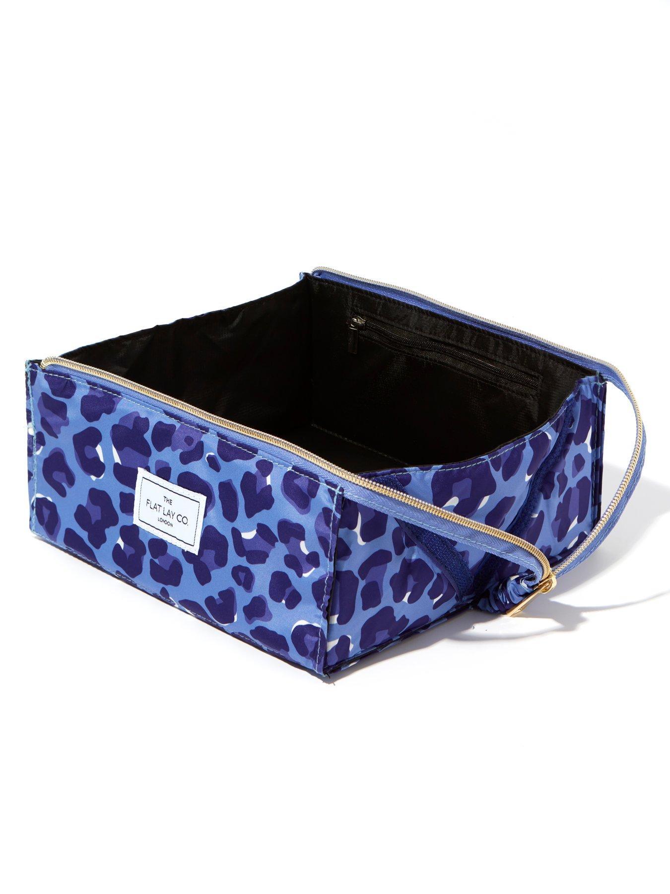 the-flat-lay-co-makeup-box-bag-in-blue-leopardback