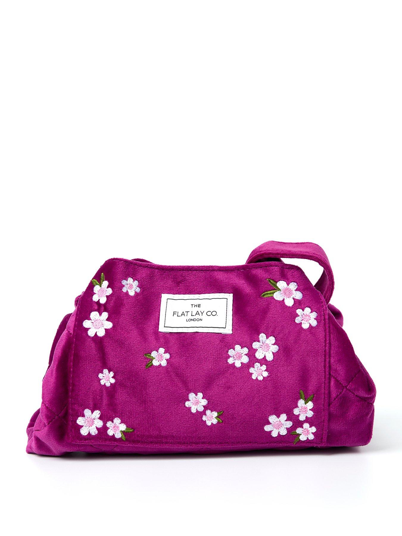 the-flat-lay-co-velvet-drawstring-makeup-bag-in-plum-daisies