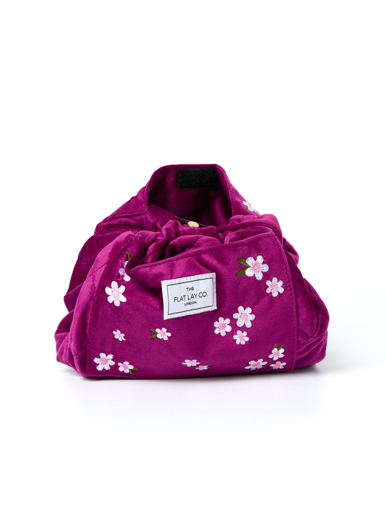 the-flat-lay-co-velvet-drawstring-makeup-bag-in-plum-daisiesstillFront