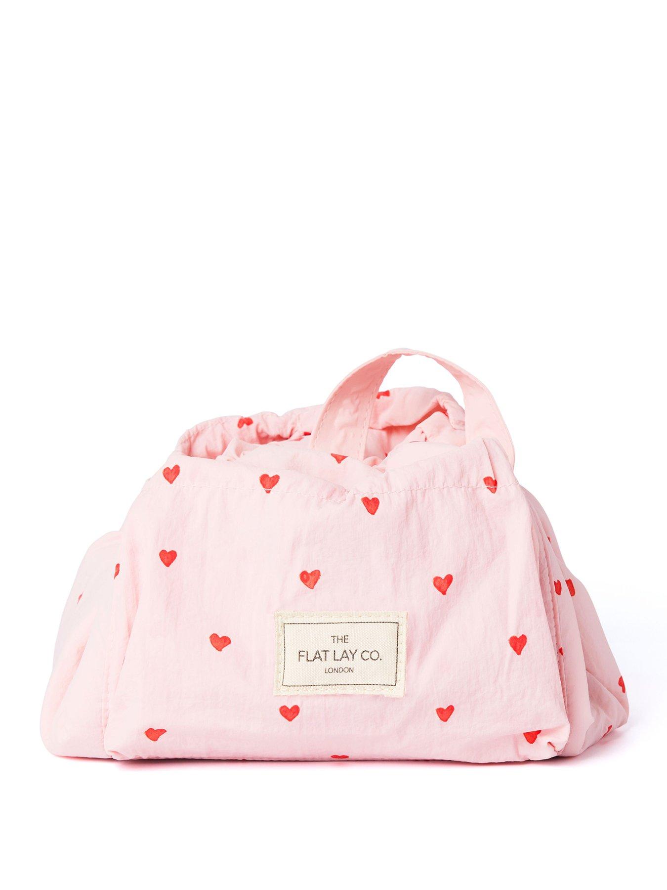 Image of The Flat Lay Co. Marshmallow Drawstring Makeup Bag in Pink Hearts