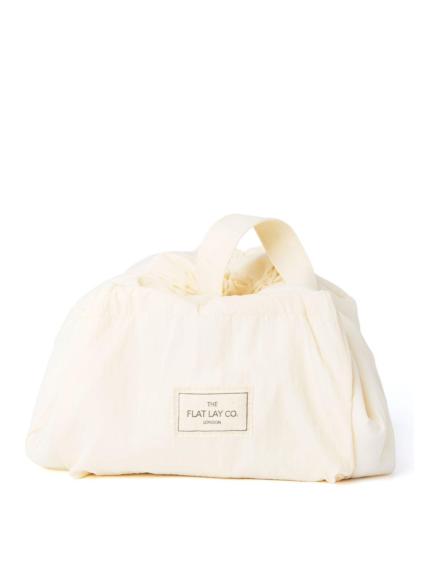 The Flat Lay Co. Marshmallow Drawstring Makeup Bag in Vanilla