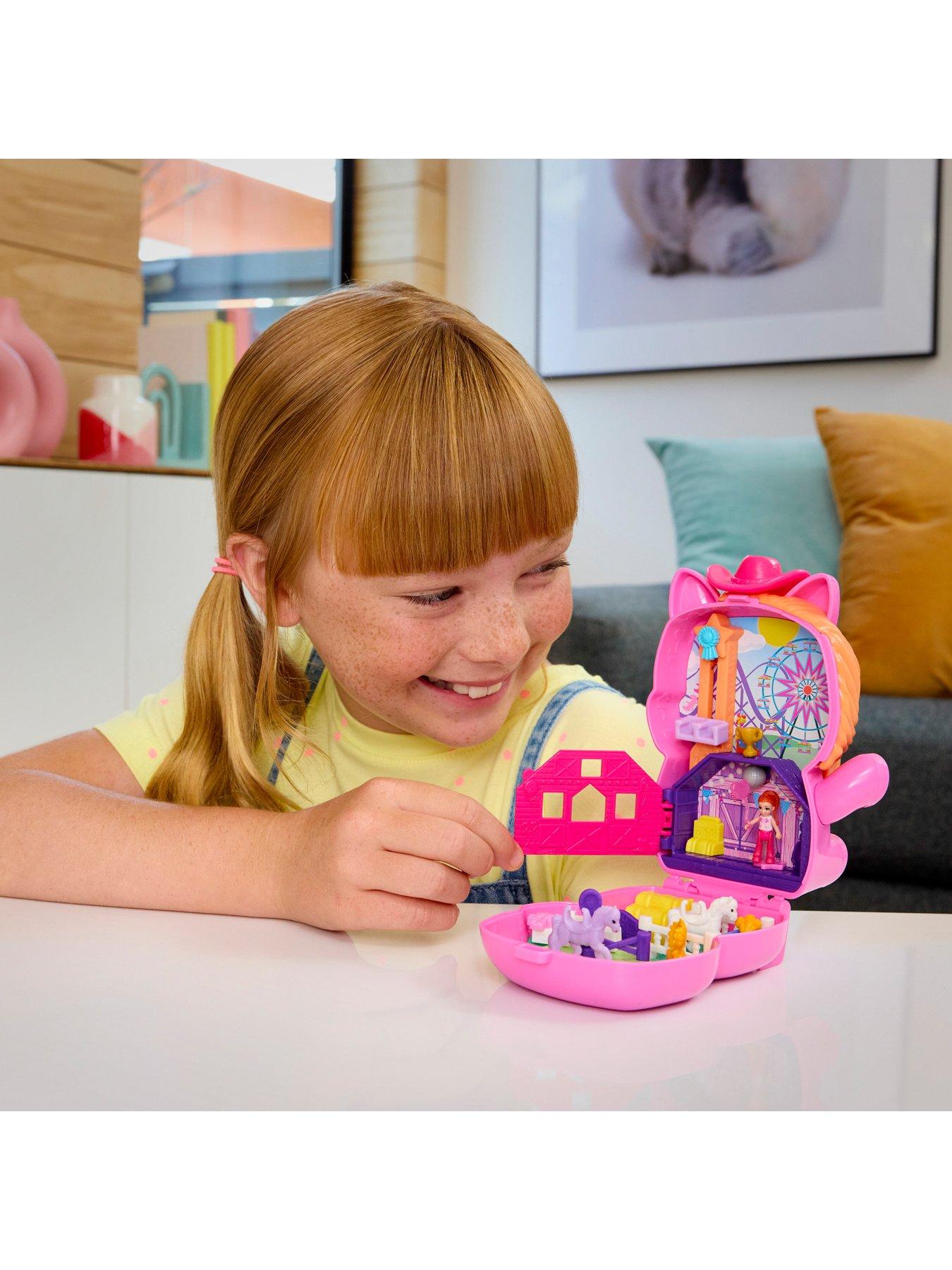 polly-pocket-polly-pocket-pony-rodeo-compact-playset-with-1-micro-doll-and-pet-horses-travel-toy-with-food-amp-styling-accessoriesstillFront