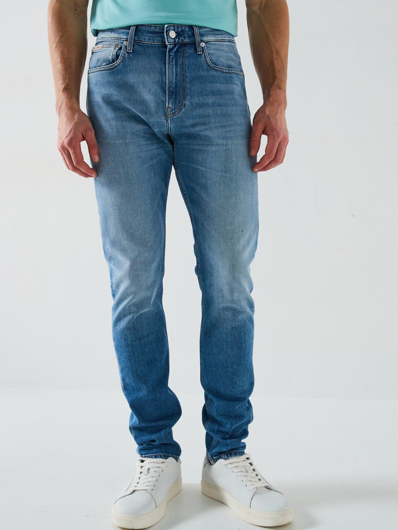 Image 1 of 5 of Calvin Klein Jeans Slim Tapered Jeans - Blue