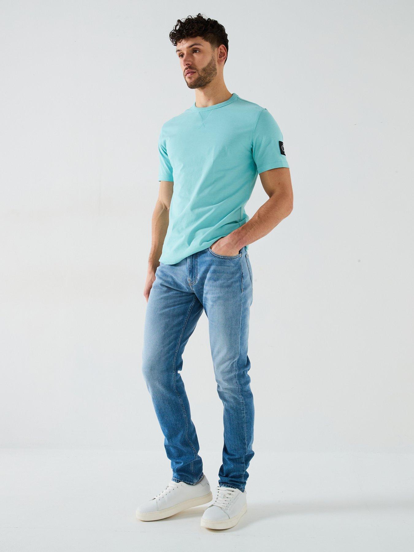 Image 3 of 5 of Calvin Klein Jeans Slim Tapered Jeans - Blue