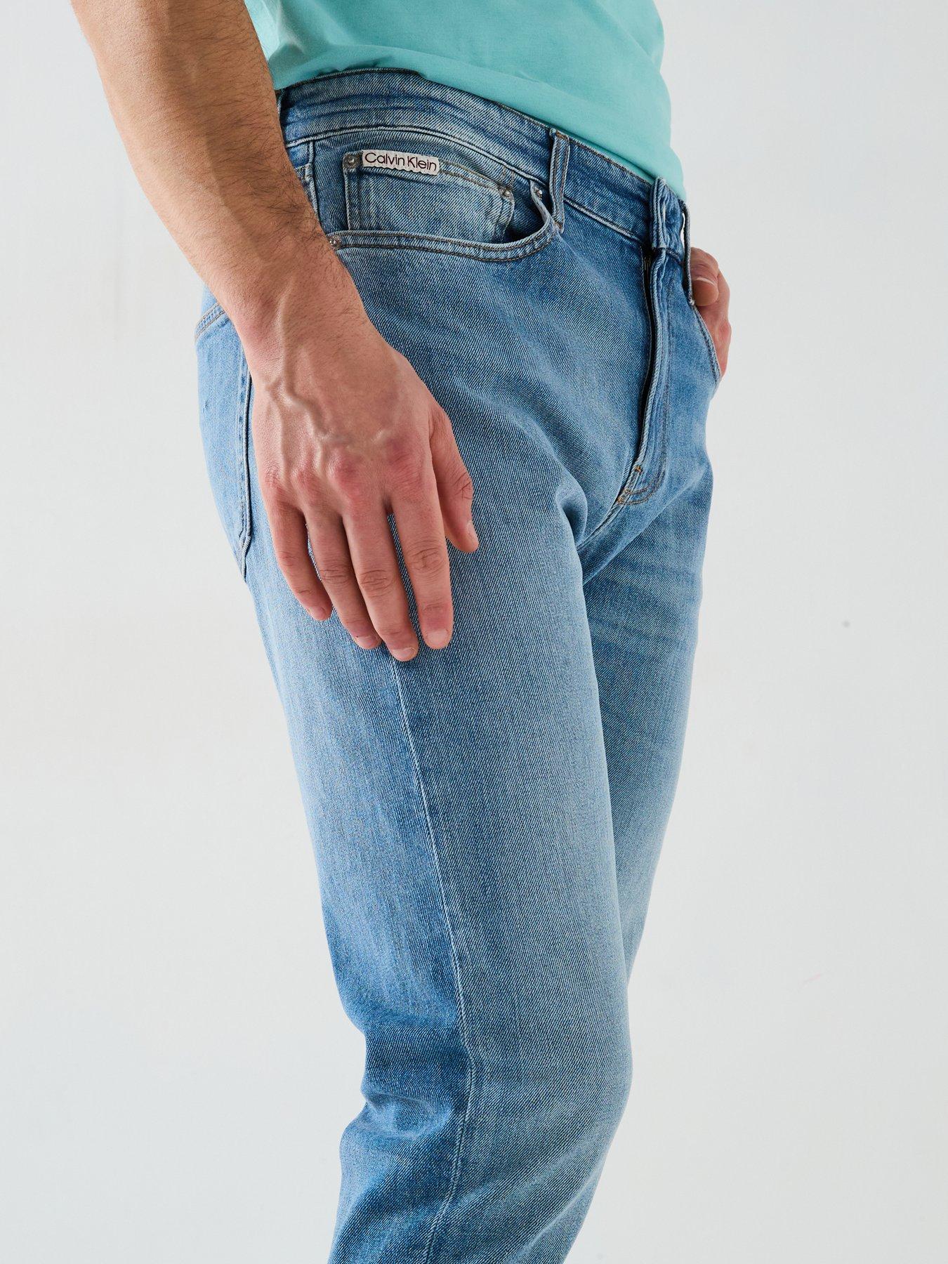 Image 4 of 5 of Calvin Klein Jeans Slim Tapered Jeans - Blue