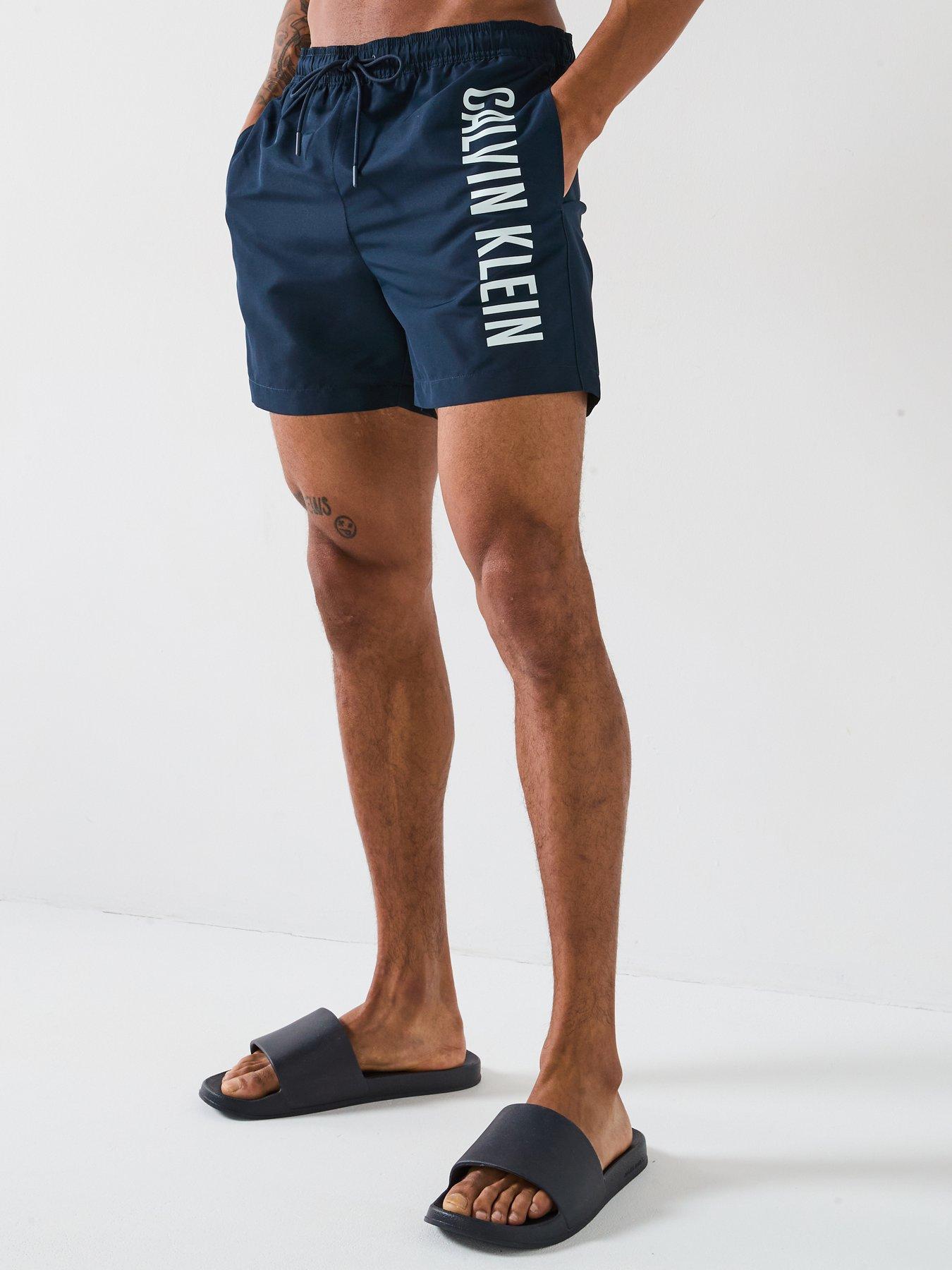 Image 1 of 4 of Calvin Klein Side Logo Swim Shorts - Navy
