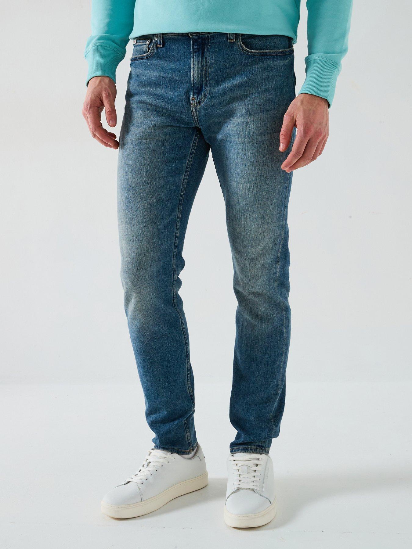 Image 1 of 6 of Calvin Klein Jeans Slim Taper Jeans - Dark Wash
