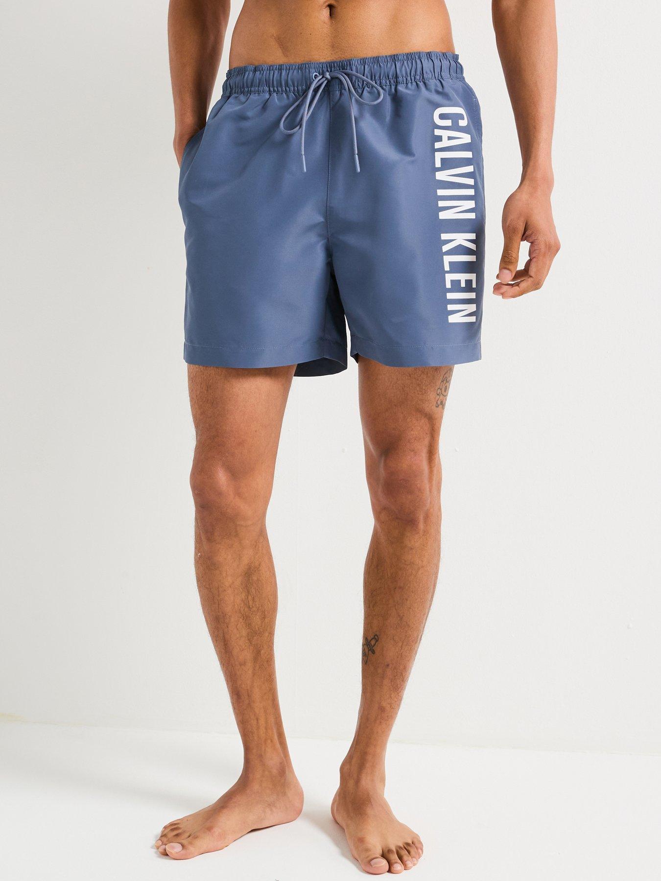 Image 1 of 5 of Calvin Klein Side Logo Swim Shorts - Blue