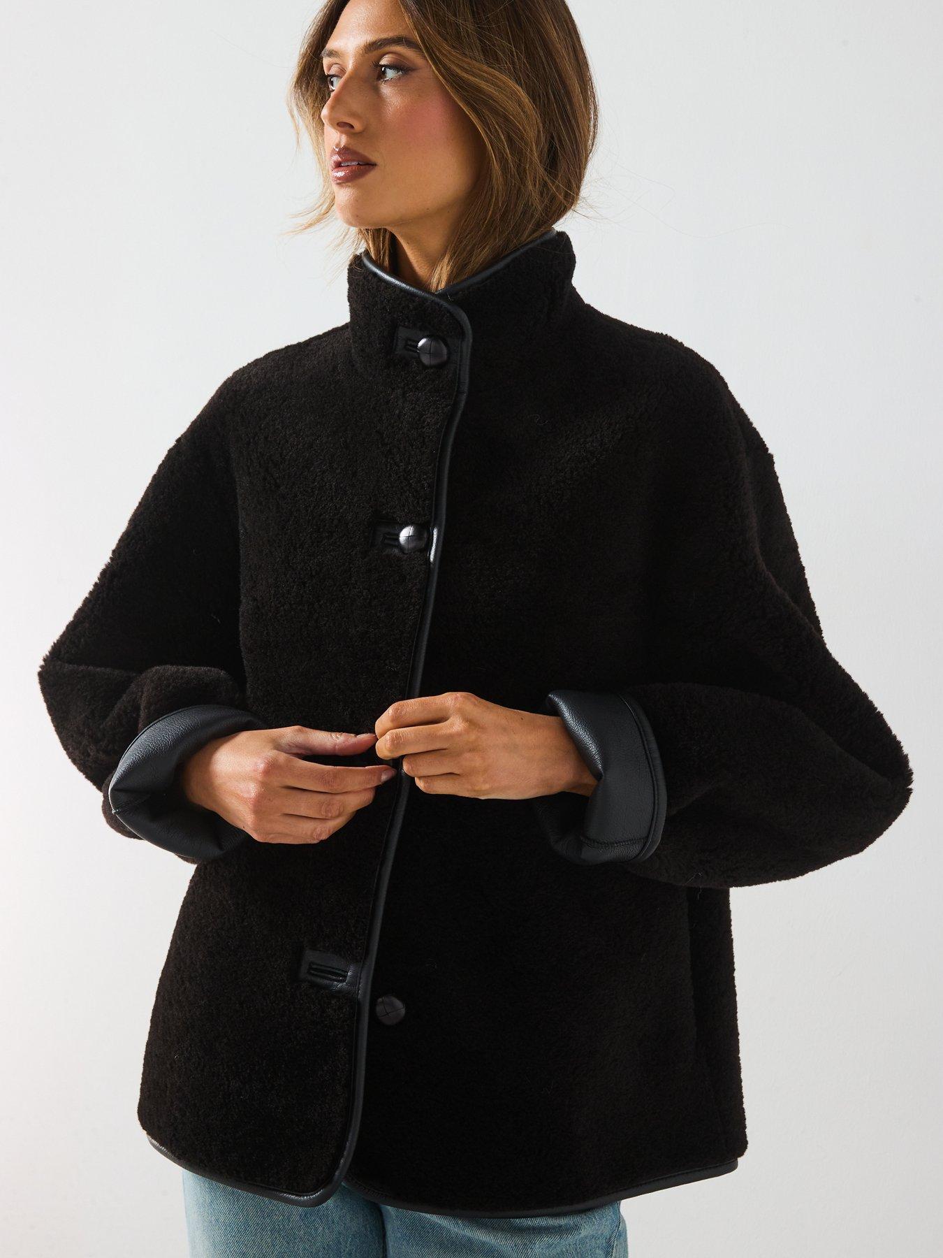 mango-fur-effect-coat-with-appliqusdetail