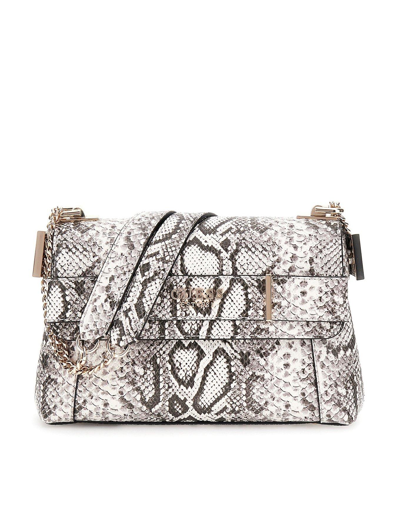 Image 1 of 3 of Guess Anadela Convertible Cross body Flap Bag - Brown Snakeskin