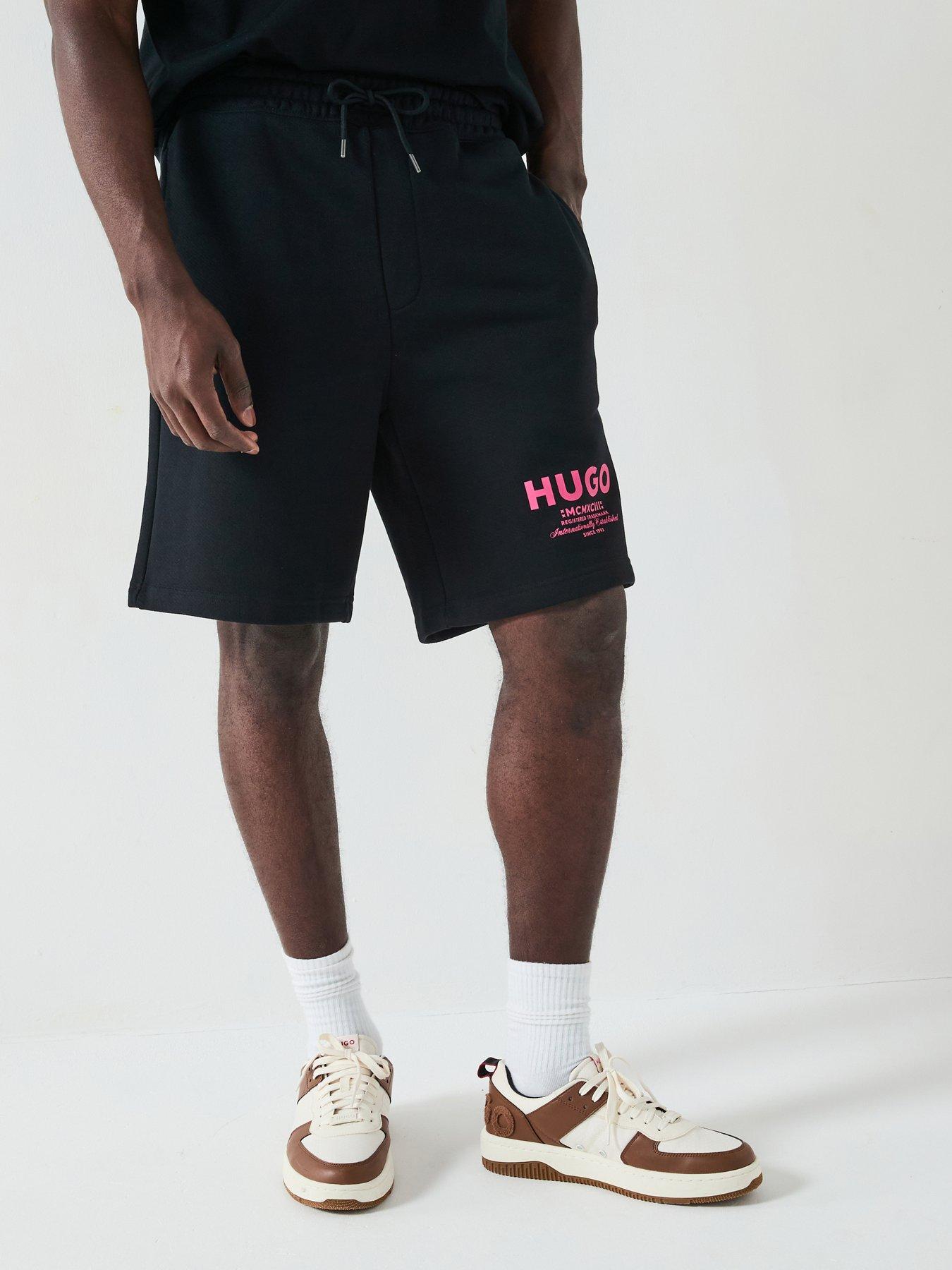 Image of HUGO Blue Nomario Oversized International Logo Jersey Shorts - Black
