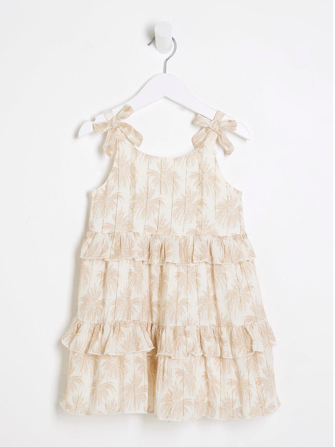 Image 1 of 4 of River Island Mini Mini Girls Shimmer Palm Beach Dress - Cream