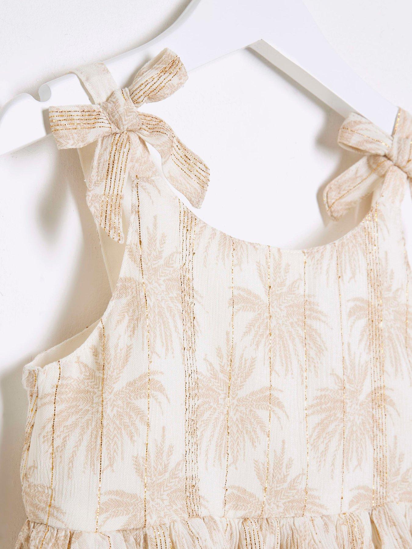 Image 4 of 4 of River Island Mini Mini Girls Shimmer Palm Beach Dress - Cream