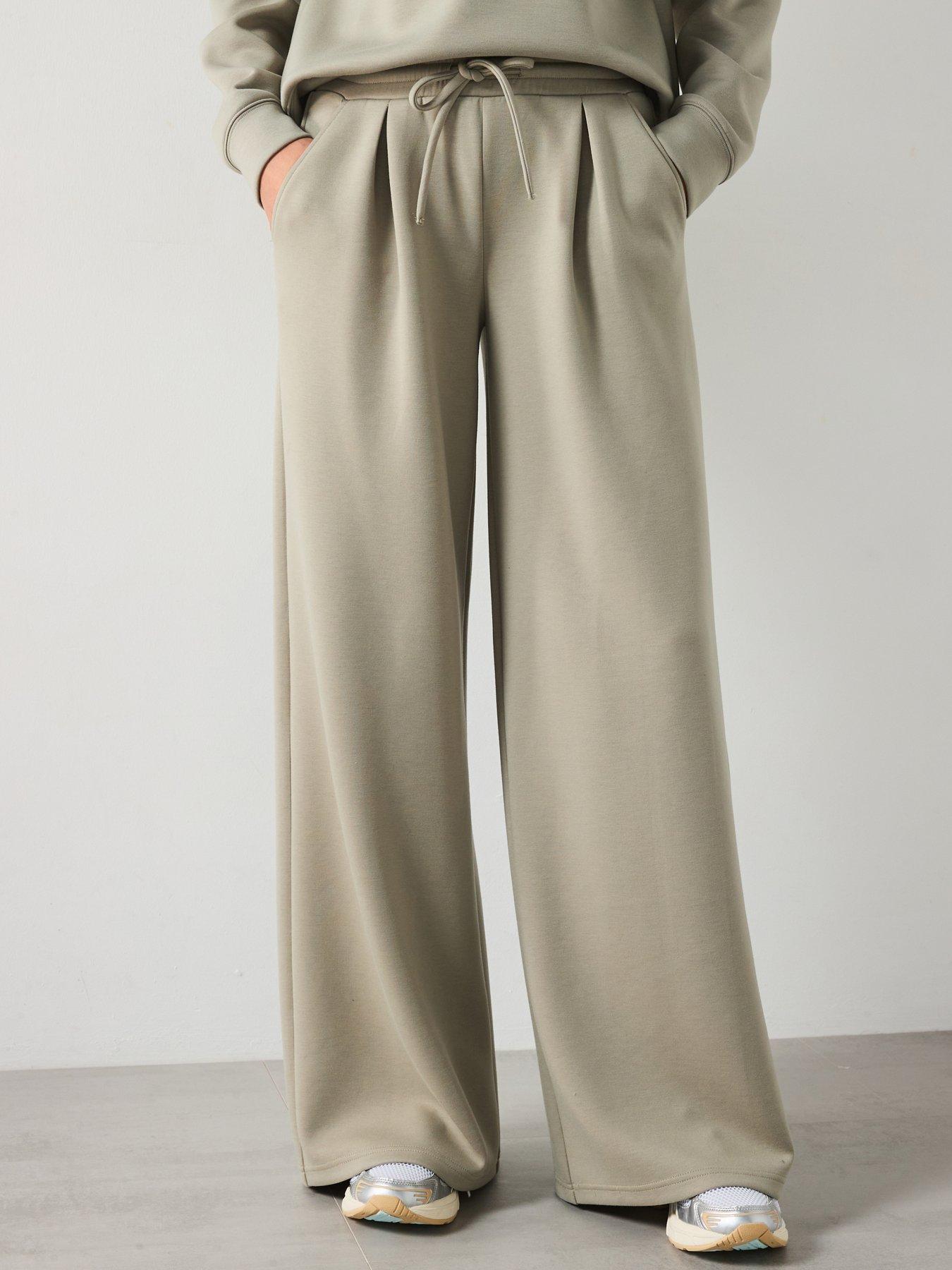 mango-wide-leg-jersey-trousers-beige