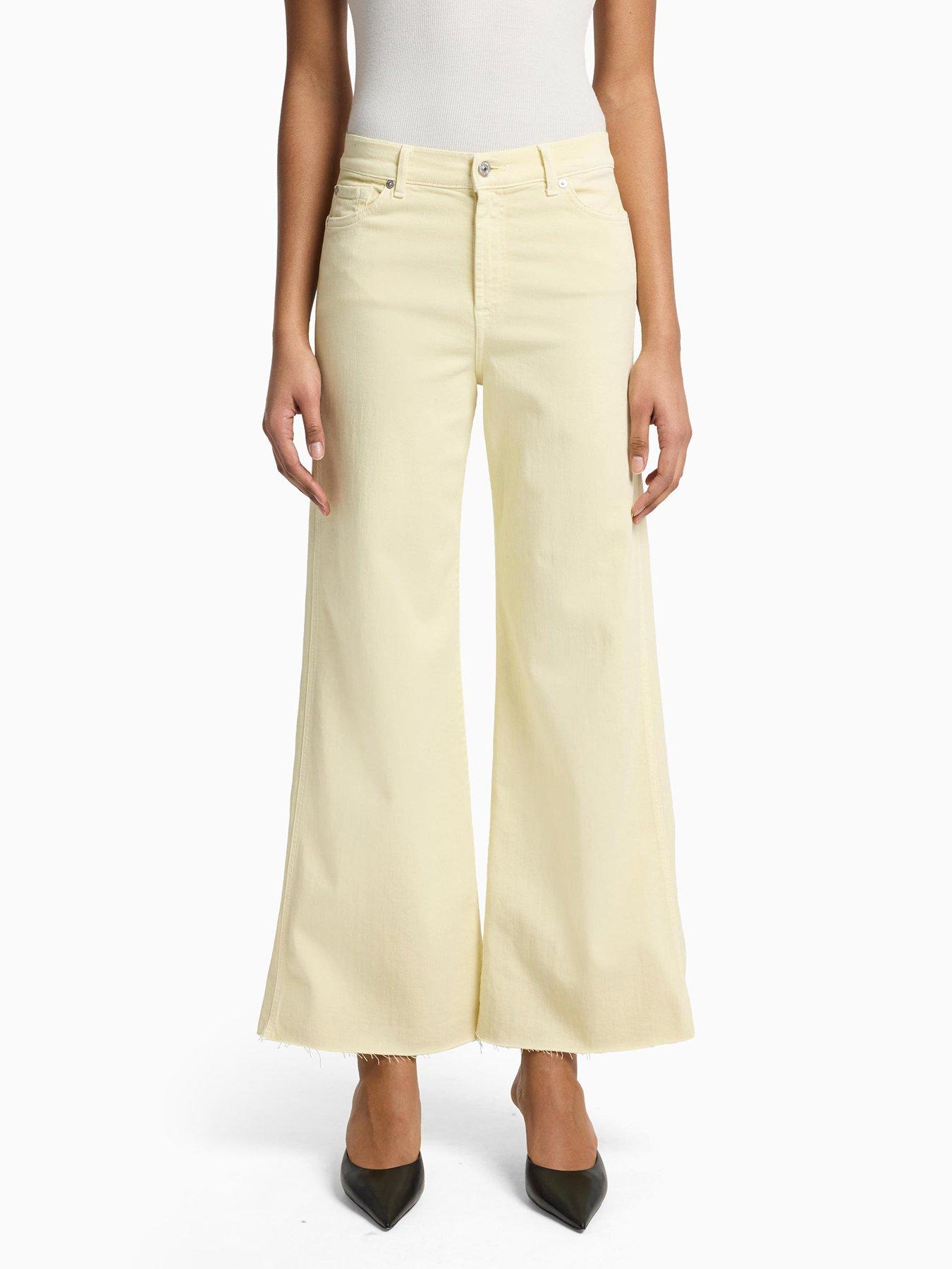 Image of 7 FOR ALL MANKIND Lotta Cropped Wide Leg Jeans With Raw Cut Hem - Light Yellow