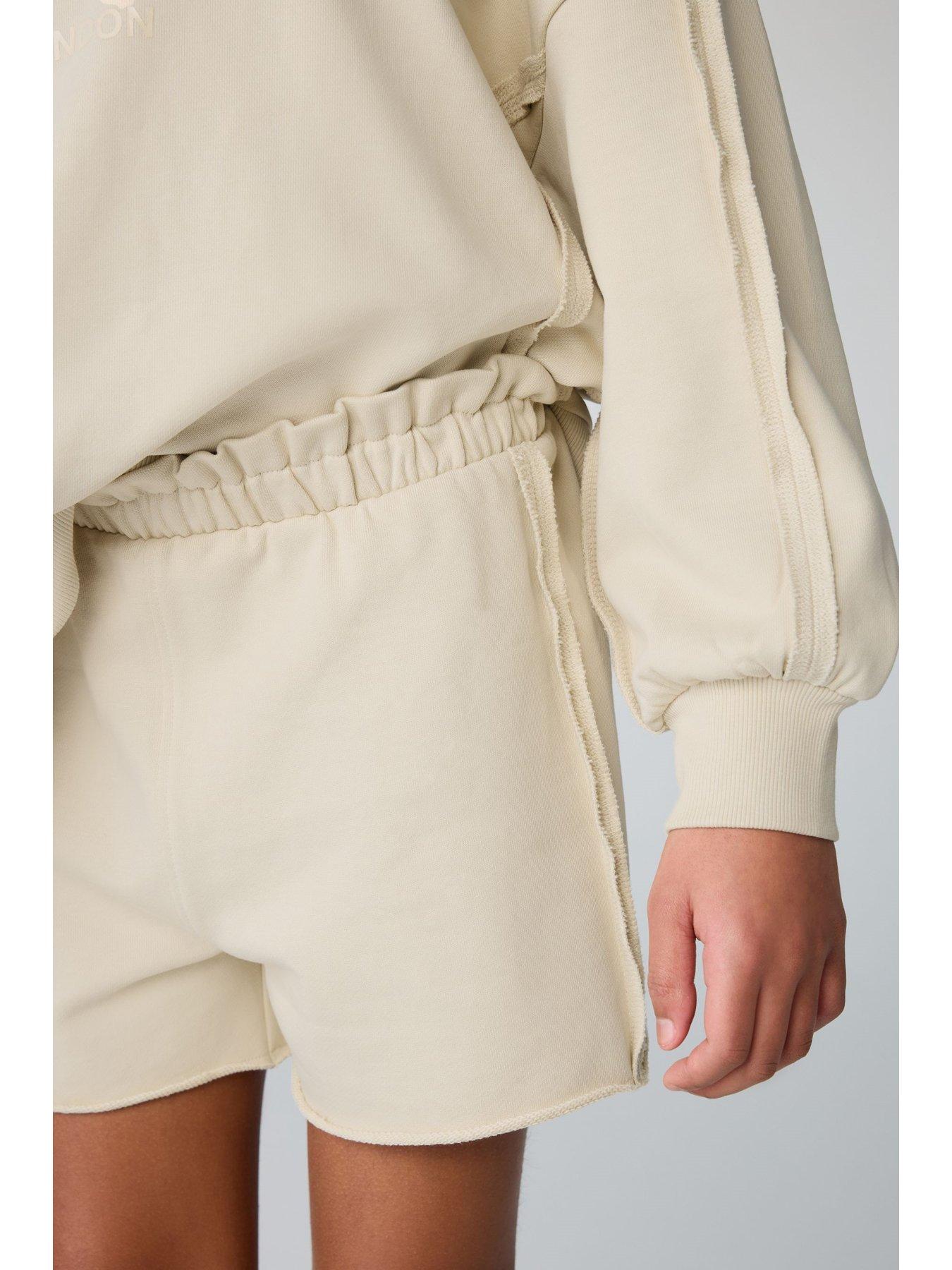 smallsaints-all-saints-raw-hem-sweat-set-beigestillFront