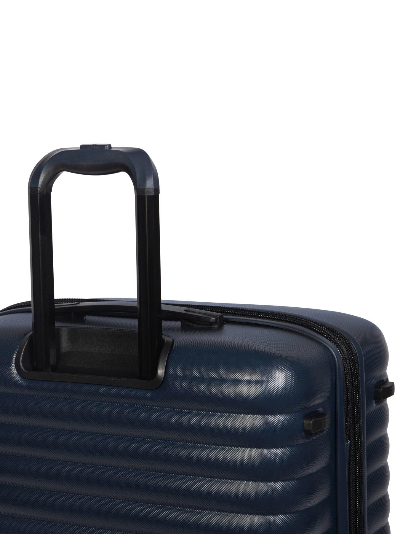 it-luggage-speedbump-navy-blue-3pc-suitcase-setback