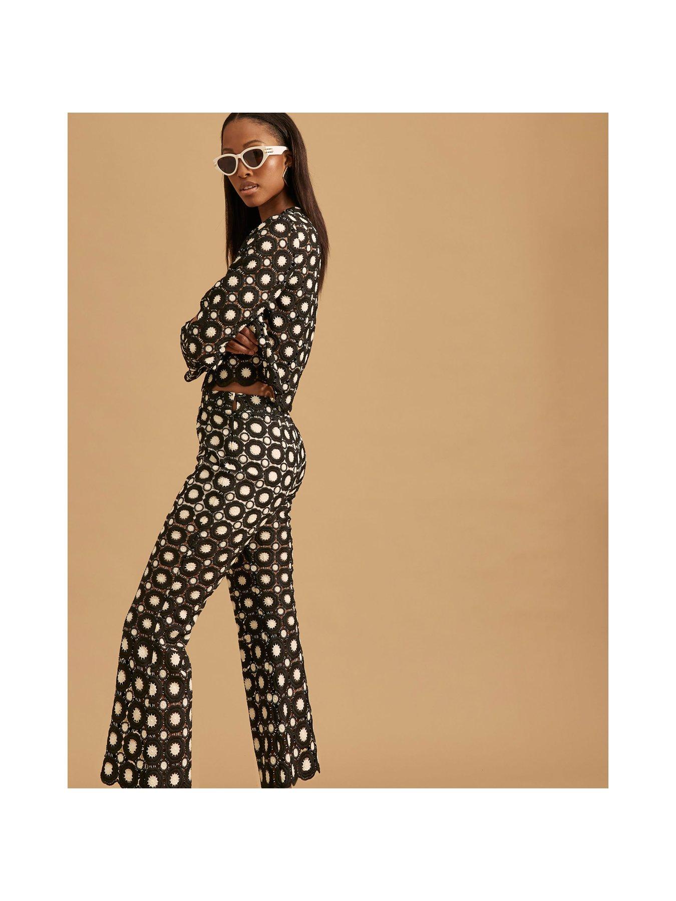 Image 2 of 4 of River Island Crochet Flare Trousers - Black