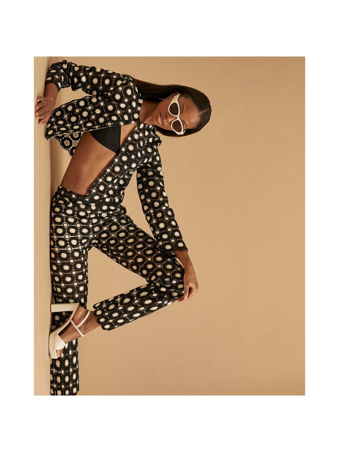 Image 4 of 4 of River Island Crochet Flare Trousers - Black