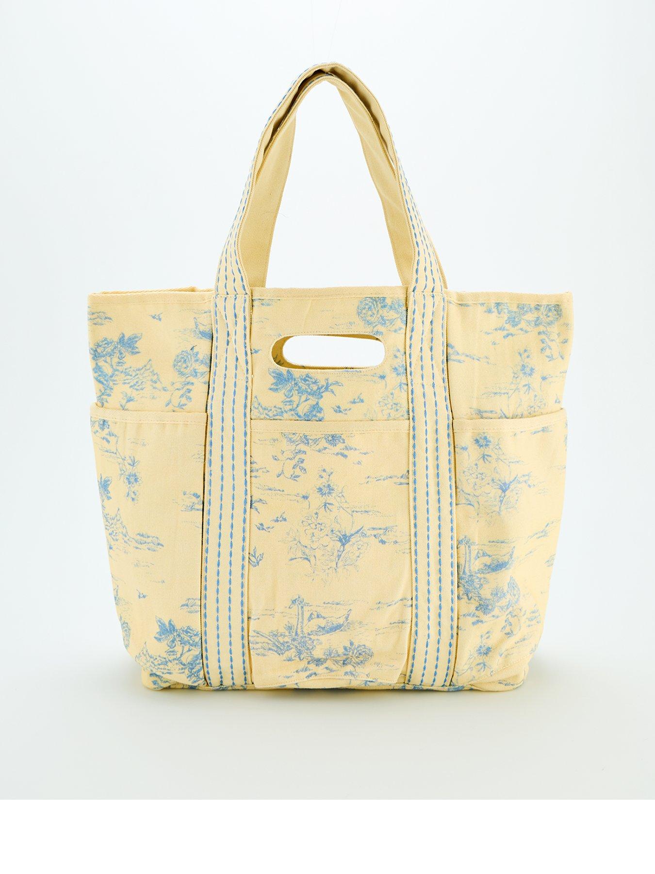 Image 1 of 4 of FREE PEOPLE Printed Caravan Tote Bag - Cream
