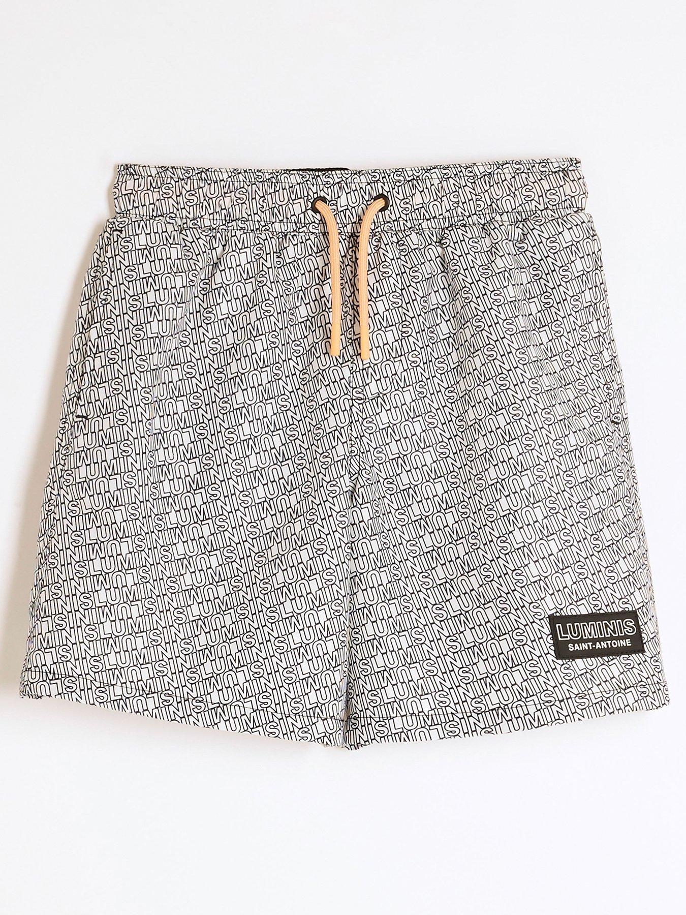 Image 1 of 4 of River Island Boys Monogram Luminis Swim Shorts - Black
