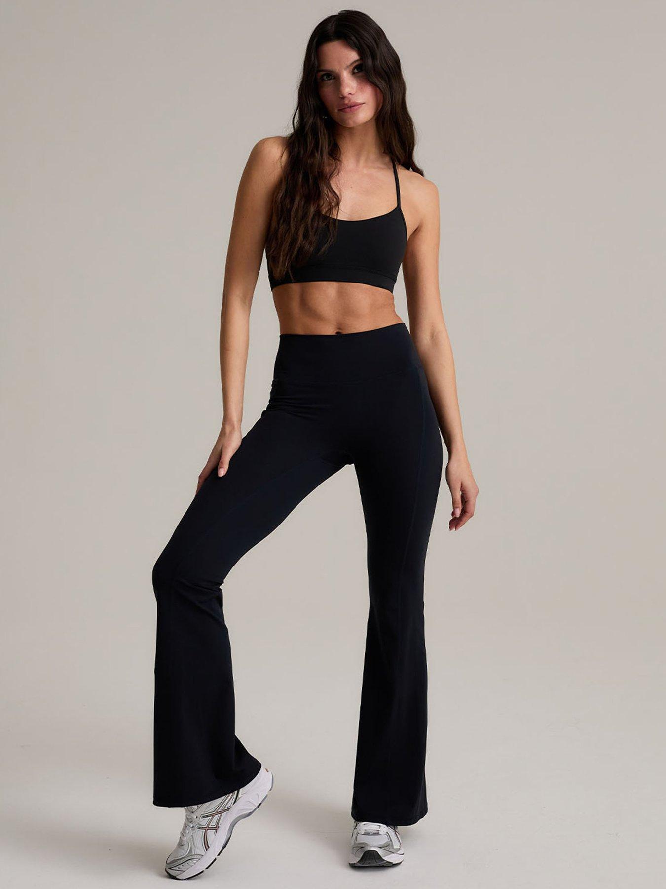 Image 1 of 5 of CHELSEA PEERS Flared Leggings - Plain Black