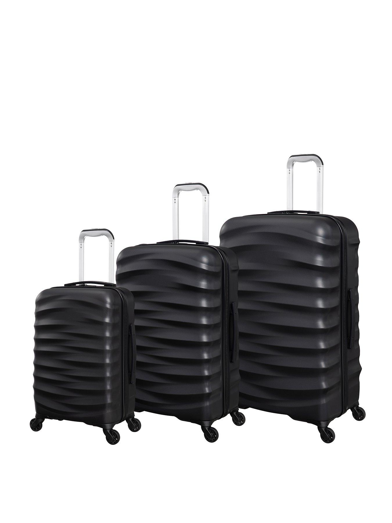 it-luggage-black-hardshell-suitcase-largestillFront