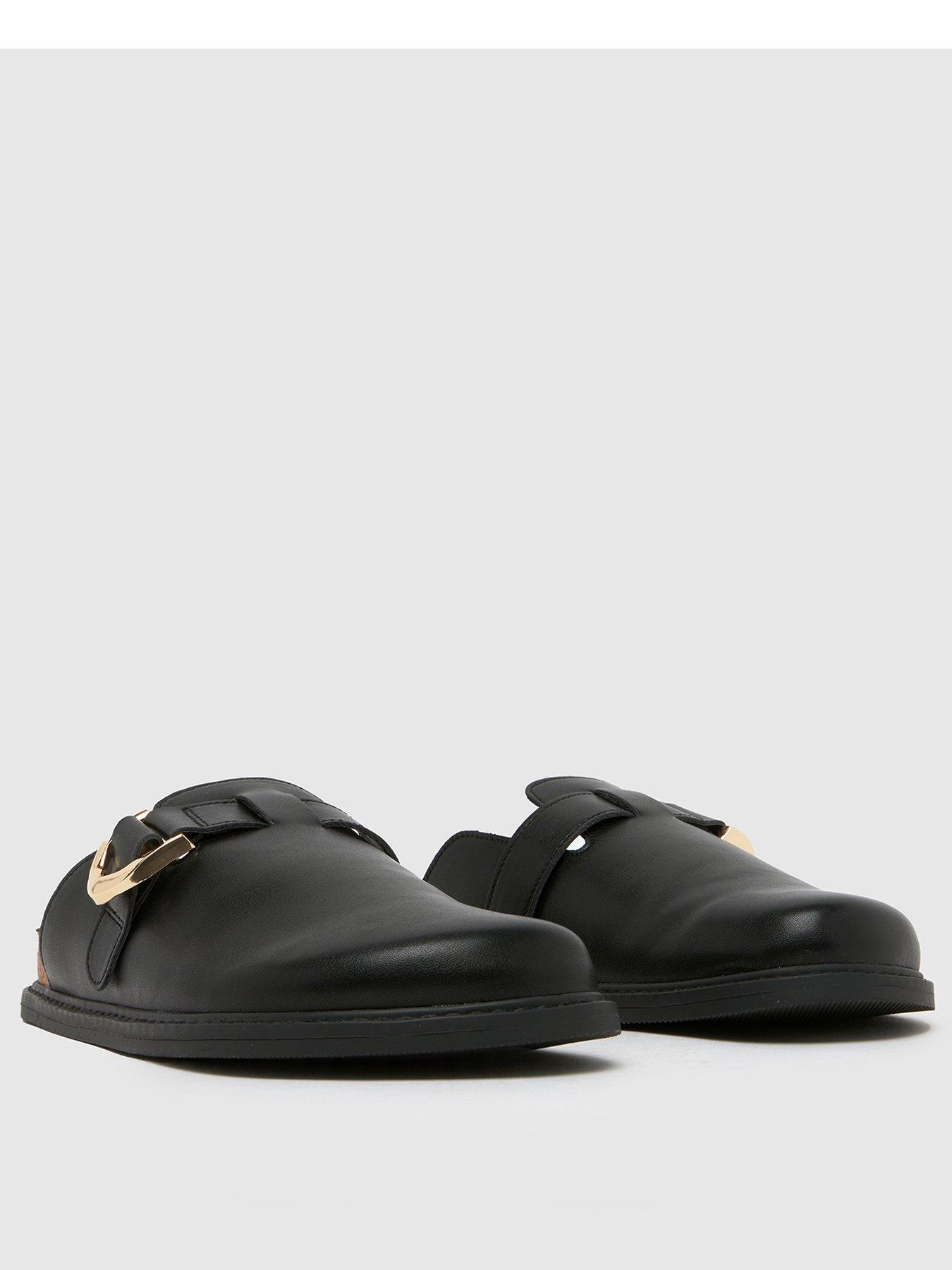 schuh-tora-mules-blackstillFront