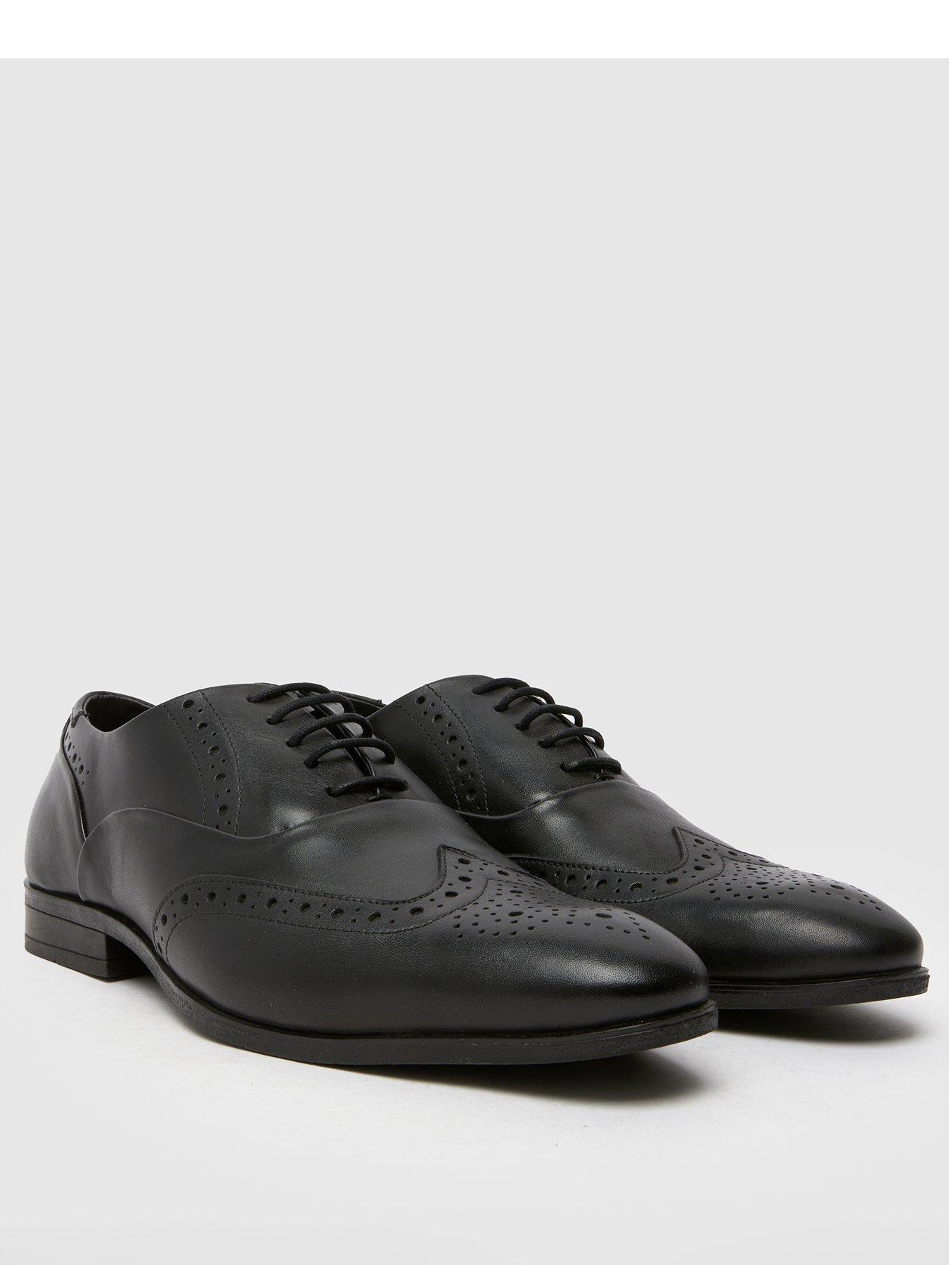 schuh-schuh-row-leather-lace-up-brogue-shoe-blackstillFront